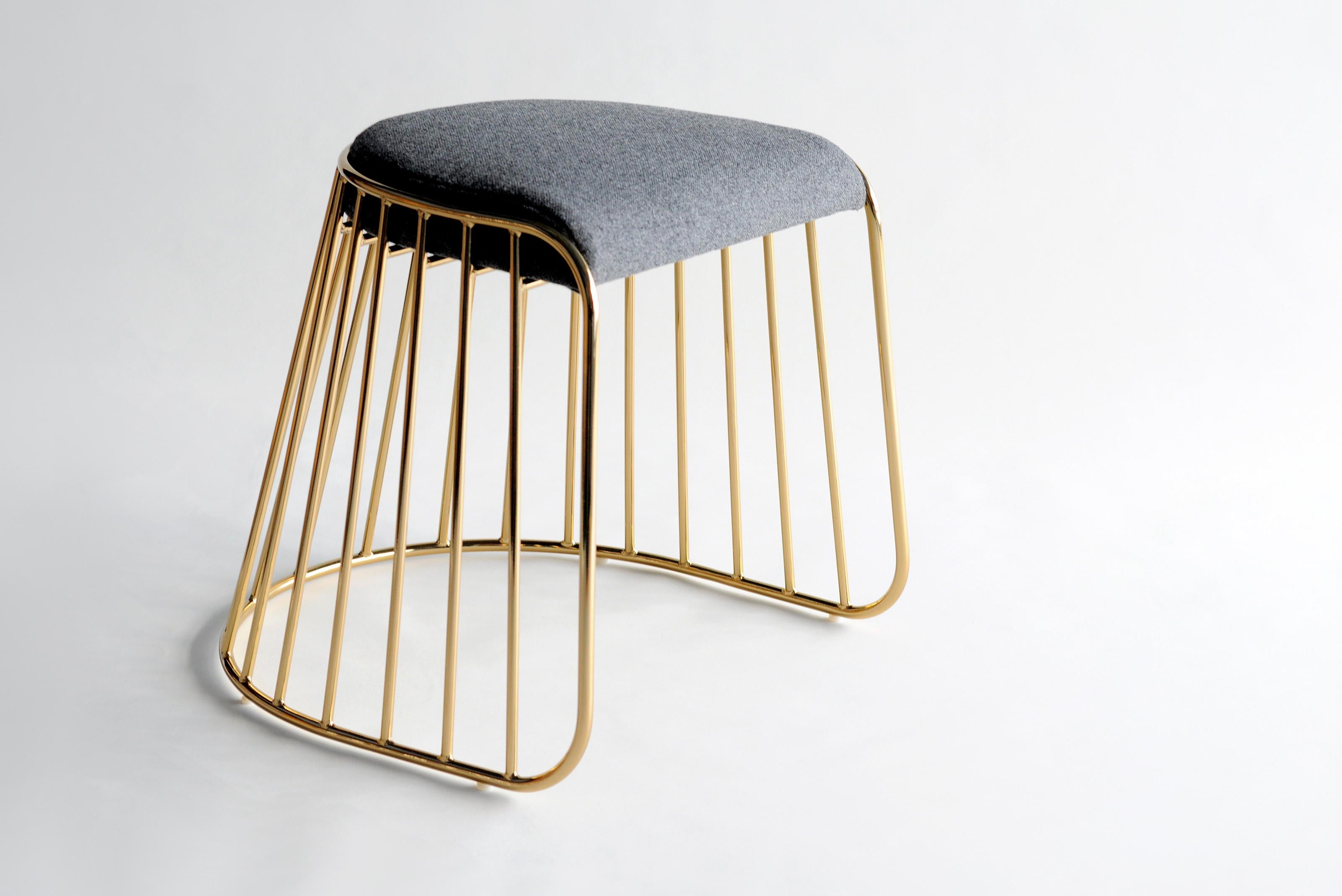 Bride’s Veil Low Stool by Phase Design
Dimensions: D 52,1 x W 53,3 x H 45,7 cm.
Materials: Upholstery, steel and smoked brass.

Solid steel bar available in a smoked brass, polished chrome, burnt copper, or powder coat finish with upholstered top.