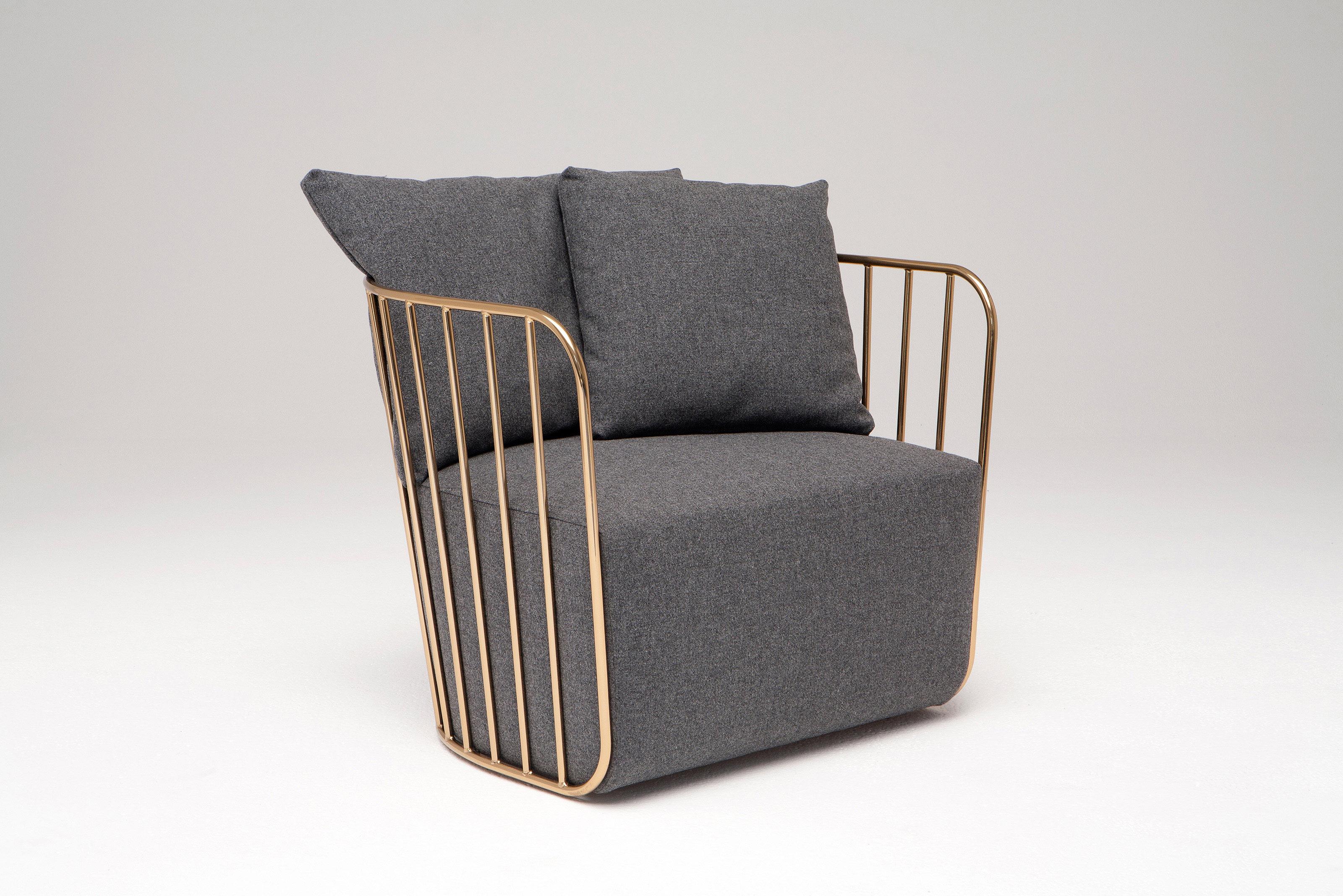 Bride’s Veil Static Chair by Phase Design
Dimensions: D 75 x W 83,2 x H 68,6 cm.
Materials: Upholstery, steel and smoked brass.

Solid steel bar available in a smoked brass, polished chrome, burnt copper, or powder coat finish with upholstery and