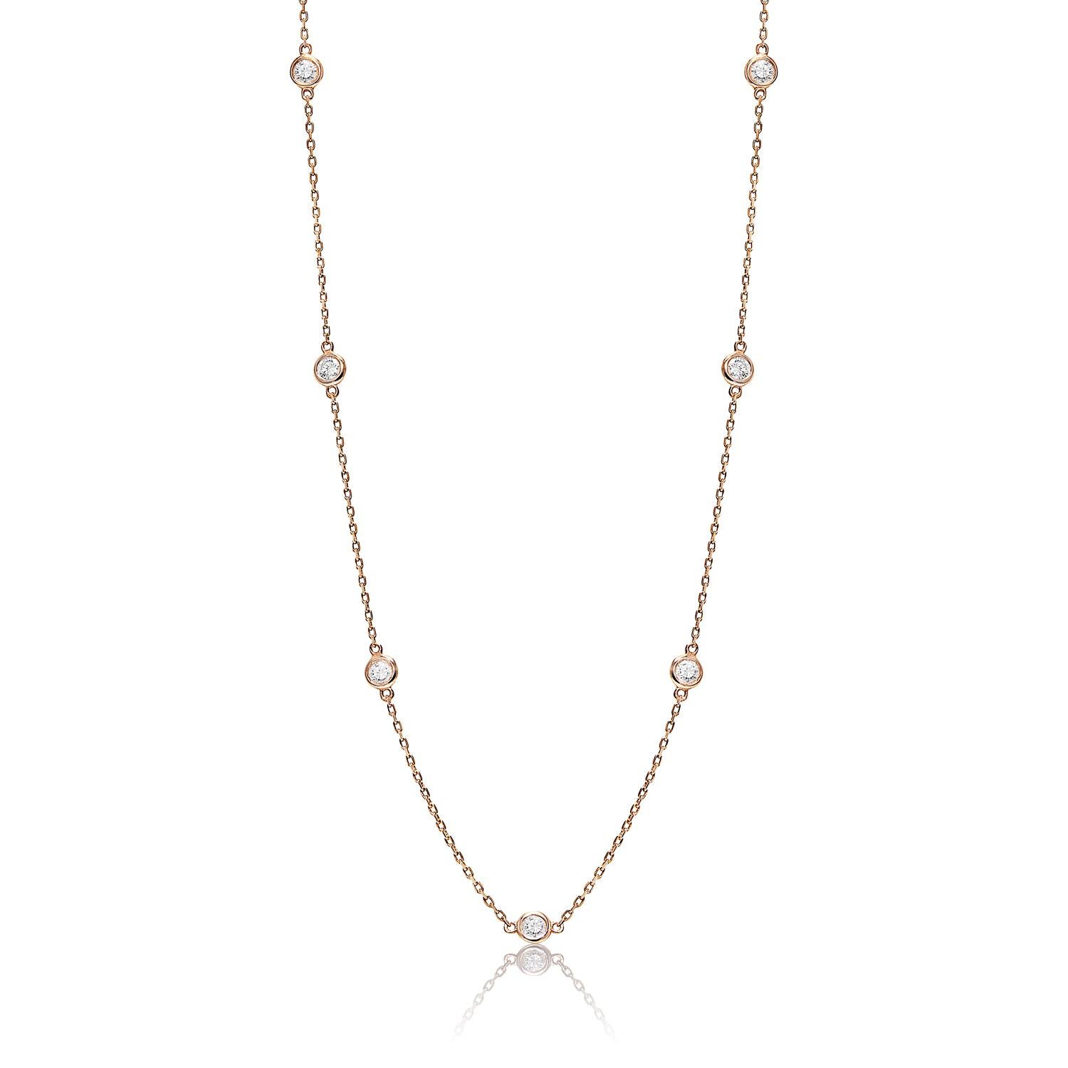 ​Looking for an exquisite diamond station necklace that will make you feel like a million bucks? Then look no further than this gorgeous Earth-Mined Diamond Necklace. Featuring a round brilliant cut station diamond for ladies with a total of 10