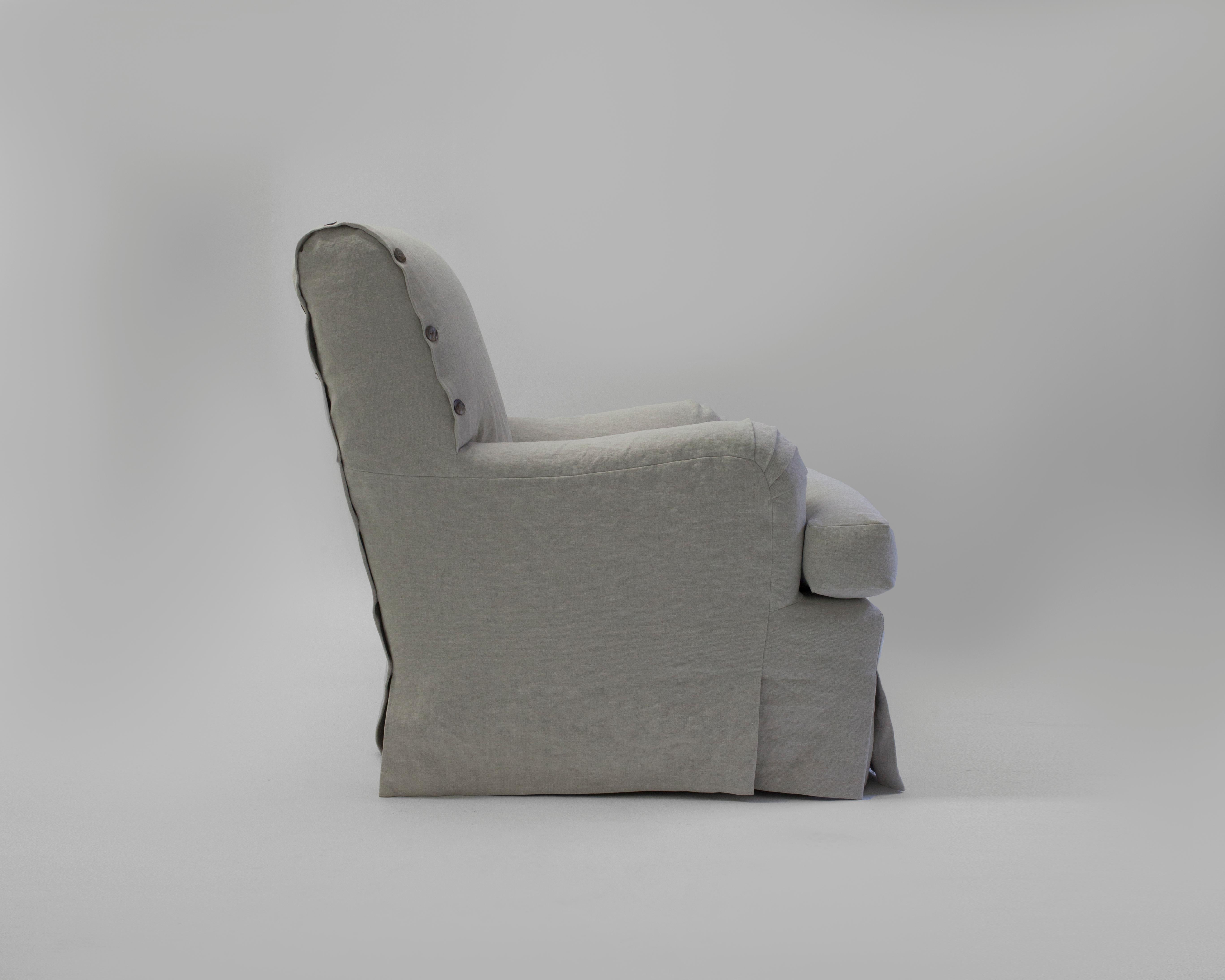 The Coteau club chair is a comfortable and relaxed look - the slipcover has special button closure which also gives a distinct view from back of club chair - hair filled scroll back and saddle arms with a feather and down loose seat cushion. Shown