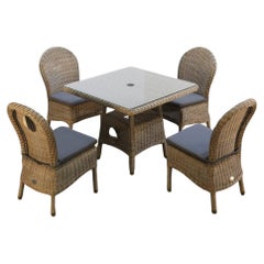 Ensemble table et chaises de salle à manger d'extérieur Bridgman Rattan Kensington