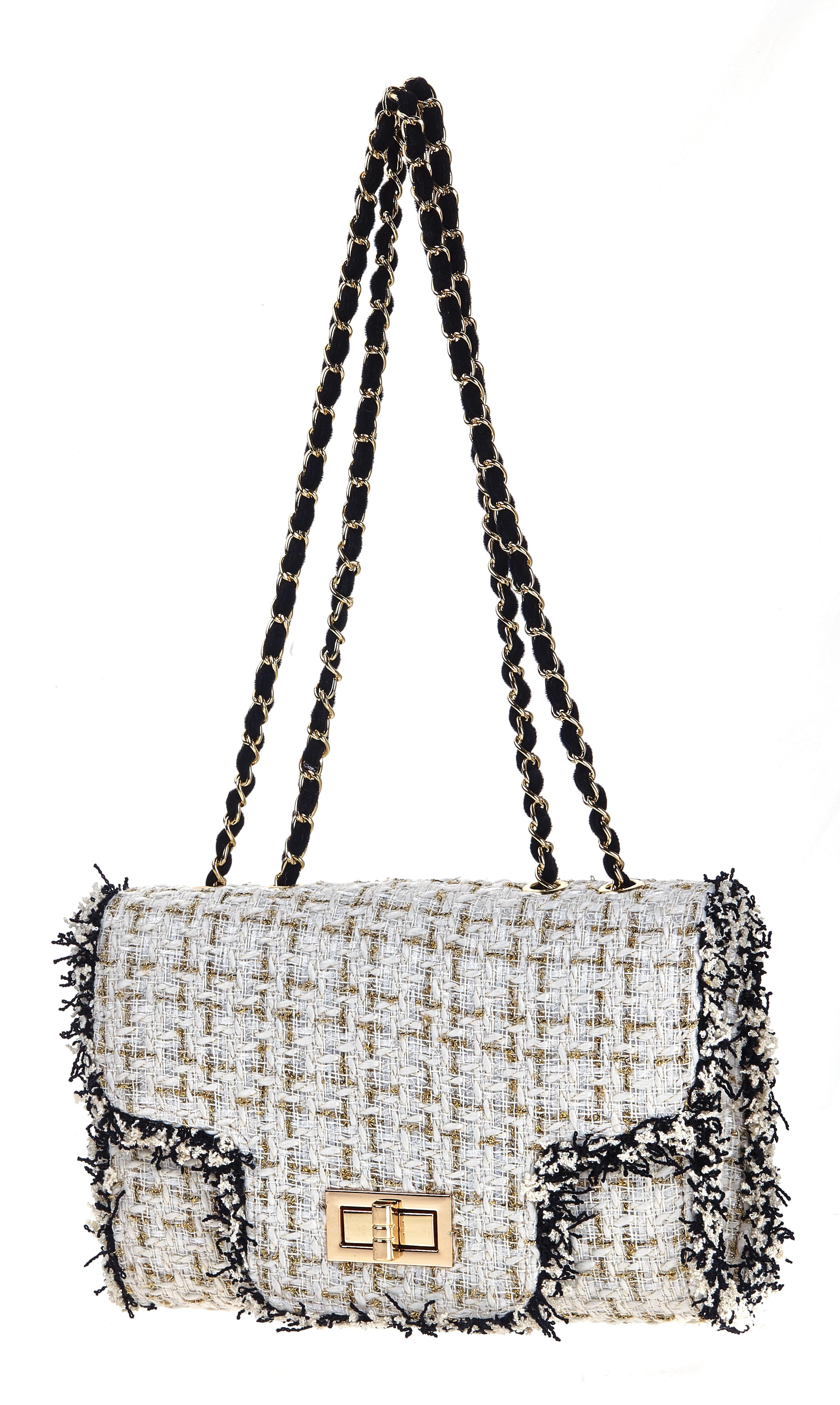 The Brielle is a classic flap bag with a plush felt woven through the chain for a softer and more elegant look.

Crossbody is pictured with removable charm; not included in purchase! 

DESCRIPTION
Fold-over flap with turn-lock closure
Tweed