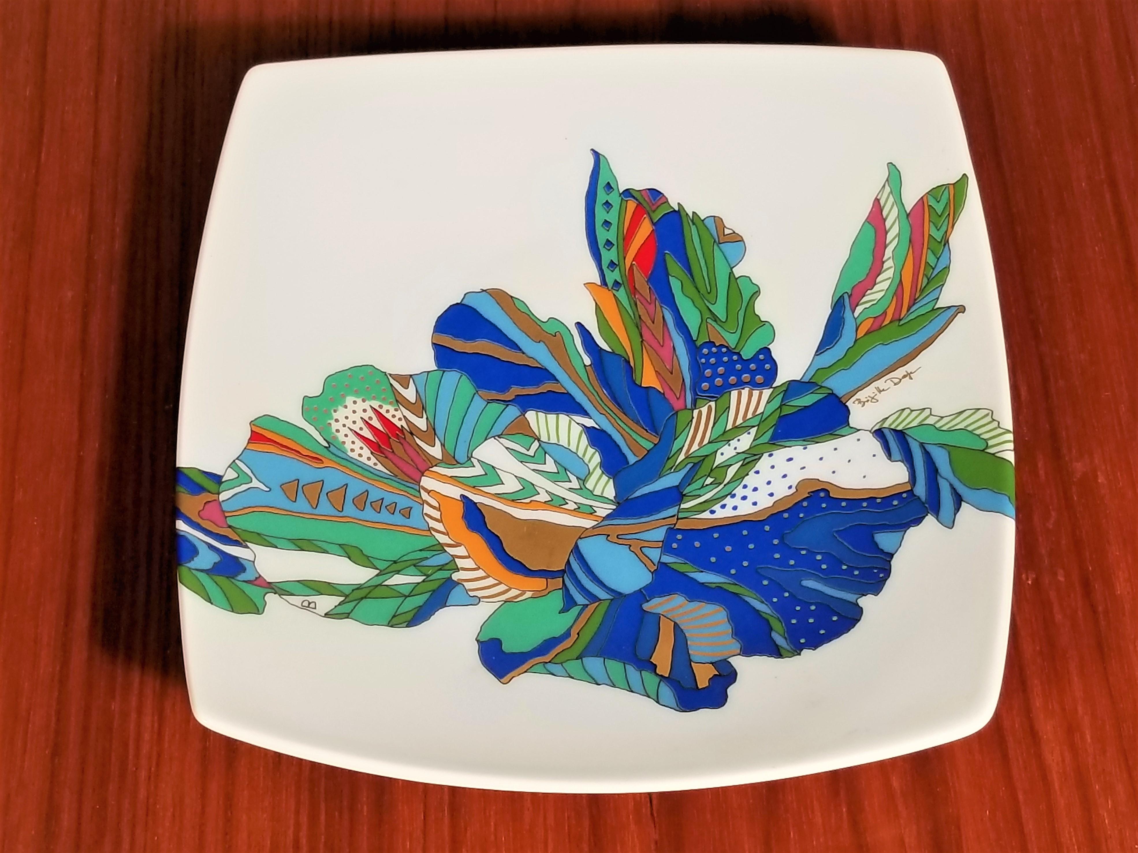 Mid Century Artist signed Brigette Deoge for Rosenthal, Germany. Gorgeous brightly colored design on white porcelain. 
Excellent Condition 
