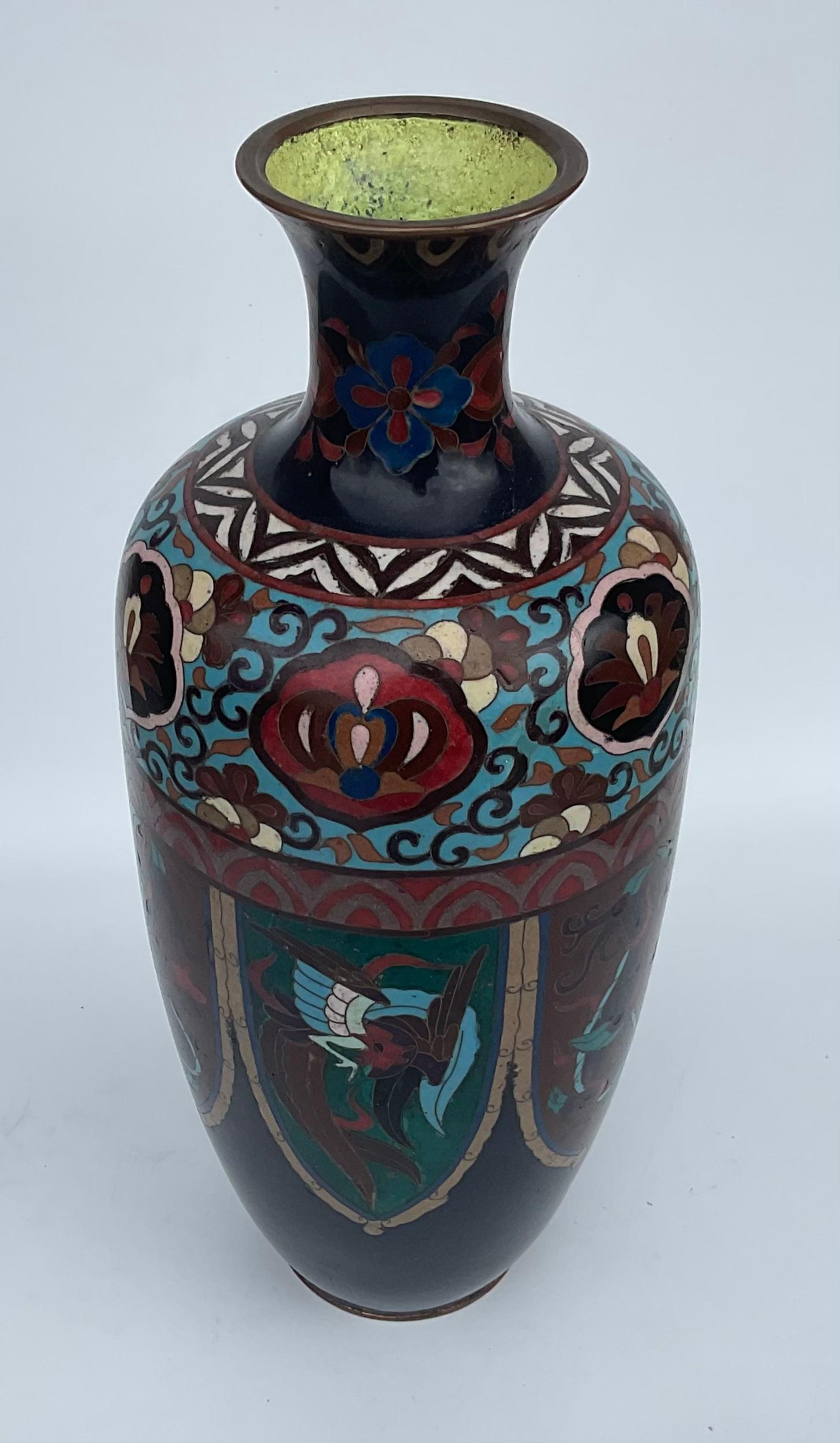 Bright and Colorful Chinese multi color Cloisonné vase with panels of dragons. Very complicated work with amazing and precise detail and coloration.