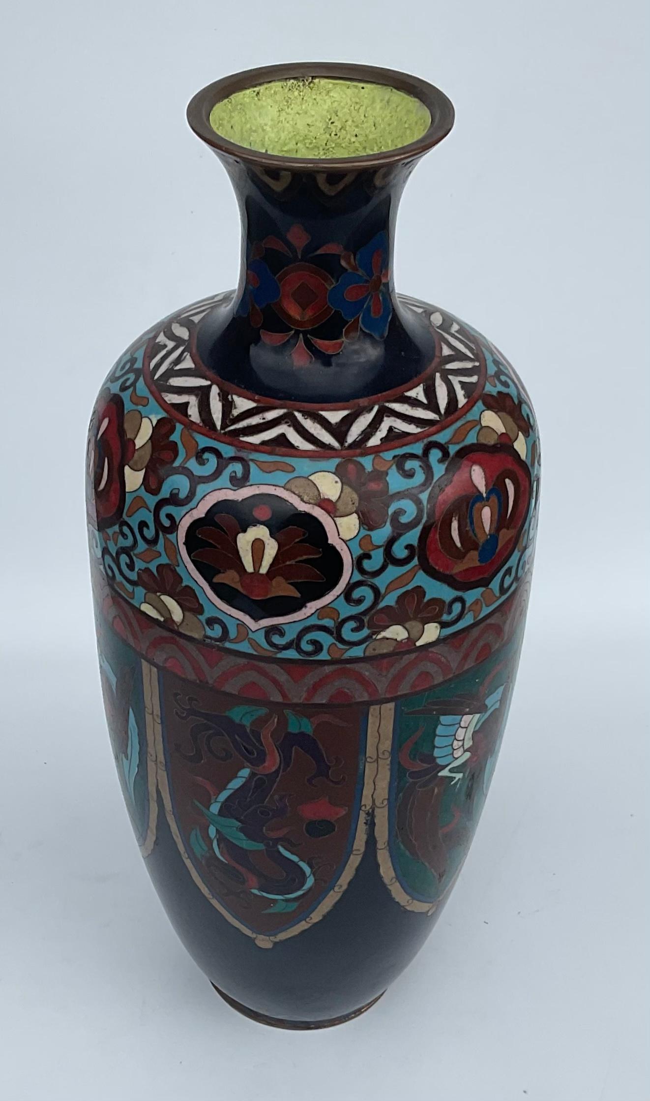 Early 20th Century Bright and Colorful Chinese Multi Color Cloisonné Vase with Panels of Dragons For Sale