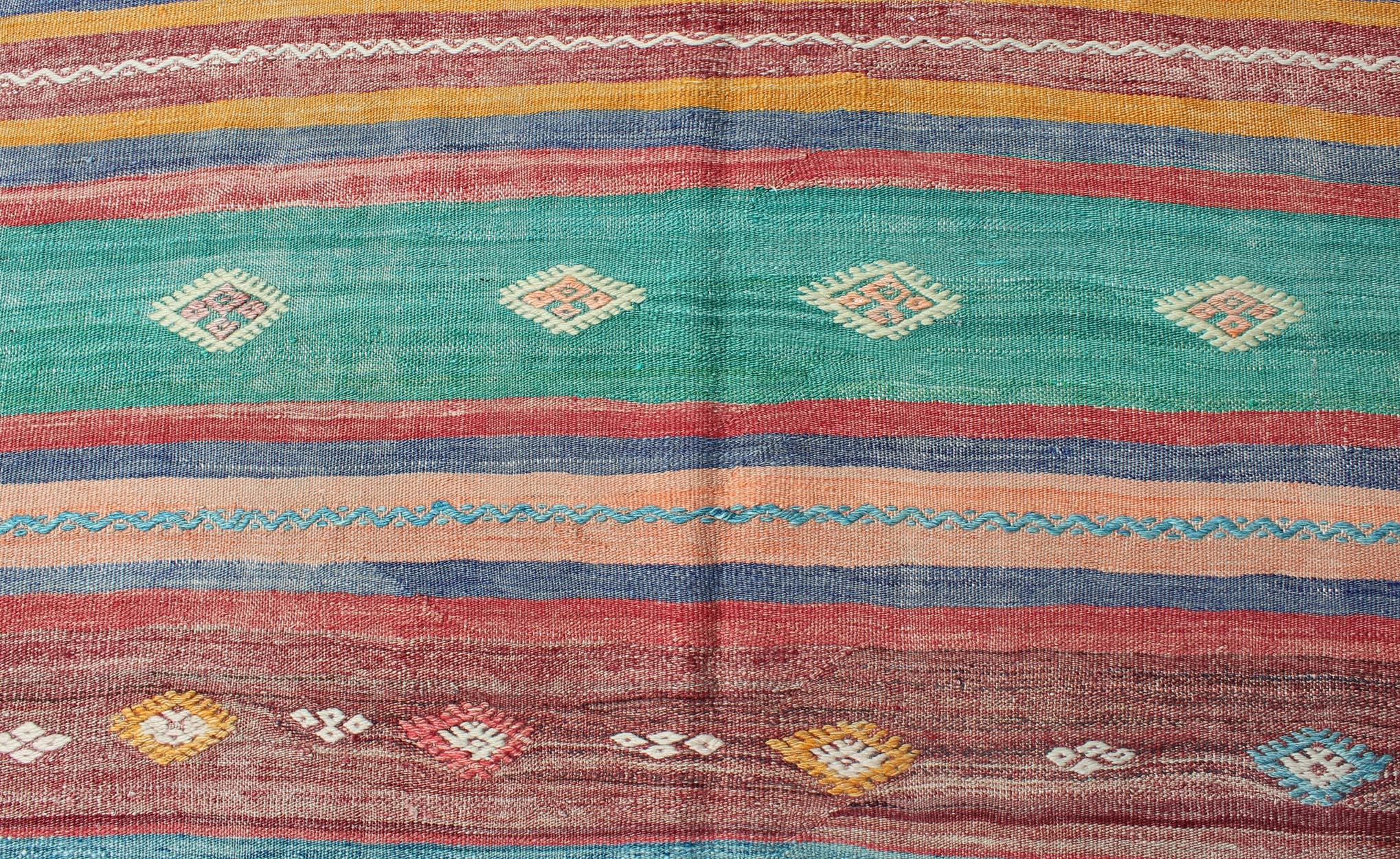 Mid-20th Century Bright and Colorful Flat-Weave Turkish Kilim Rug with Geometric Stripe Design For Sale