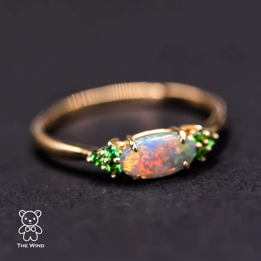 Bright Australian Semi-Black Opal and Tsavorite Garnet Engagement Wedding Ring.


Free Domestic USPS First Class Shipping! Free Gift Bag or Box with every order!

Opal—the queen of gemstones, is one of the most beautiful gemstones in the world.