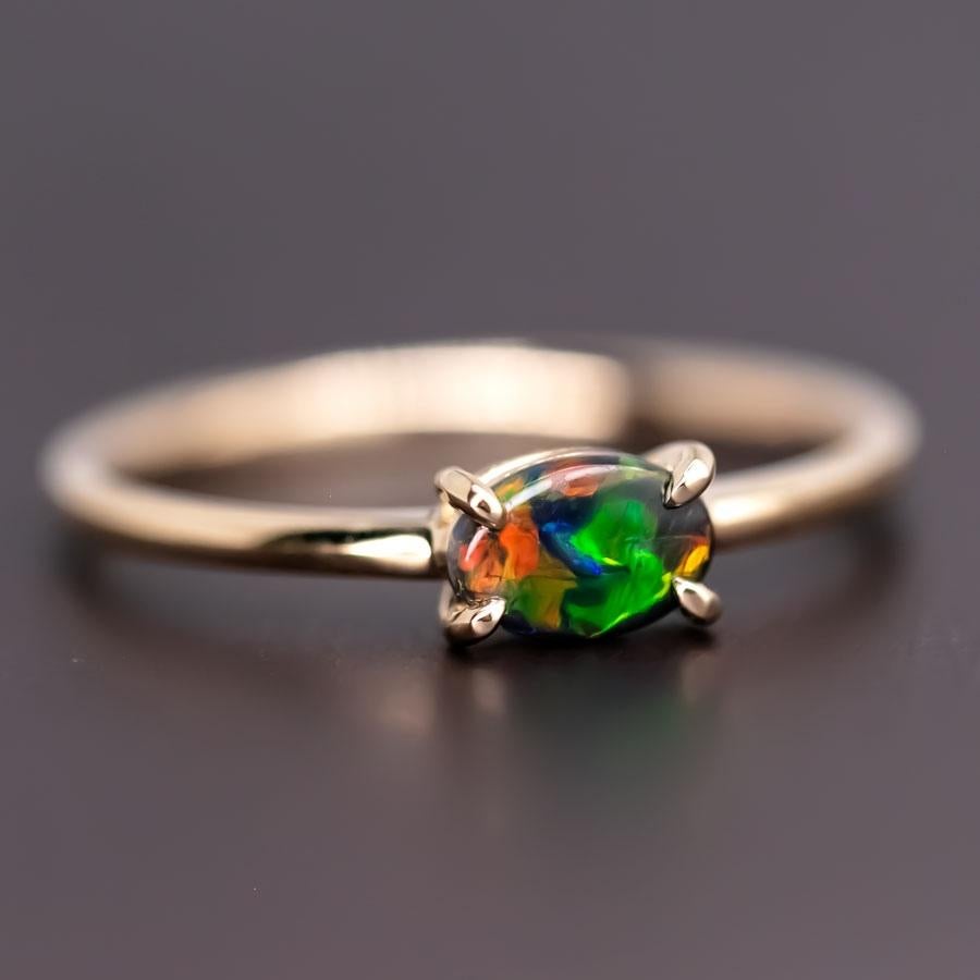 Bright Color Australian Black Opal Band Engagement Wedding Ring 18K Yellow Gold.

Free Domestic USPS First Class Shipping! Free Gift Bag or Box with every order!

Opal—the queen of gemstones, is one of the most beautiful gemstones in the world.