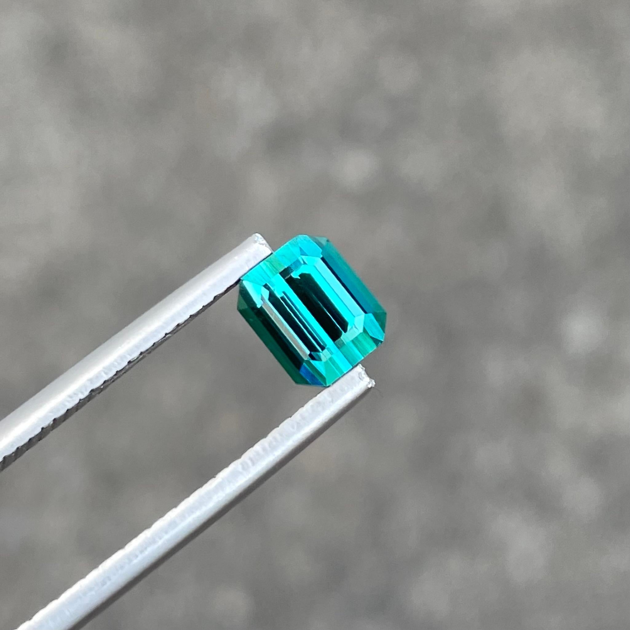 Weight 1.45 carats 
Dimensions 6.6 x 5.6 x 4.7 mm
Treatment None 
Origin Afghanistan 
Clarity Eye Clean 
Shape Octagon 
Cut Emerald




Discover the alluring charm of our Blue Tourmaline, a 1.45 carat gemstone of unparalleled beauty, cut to