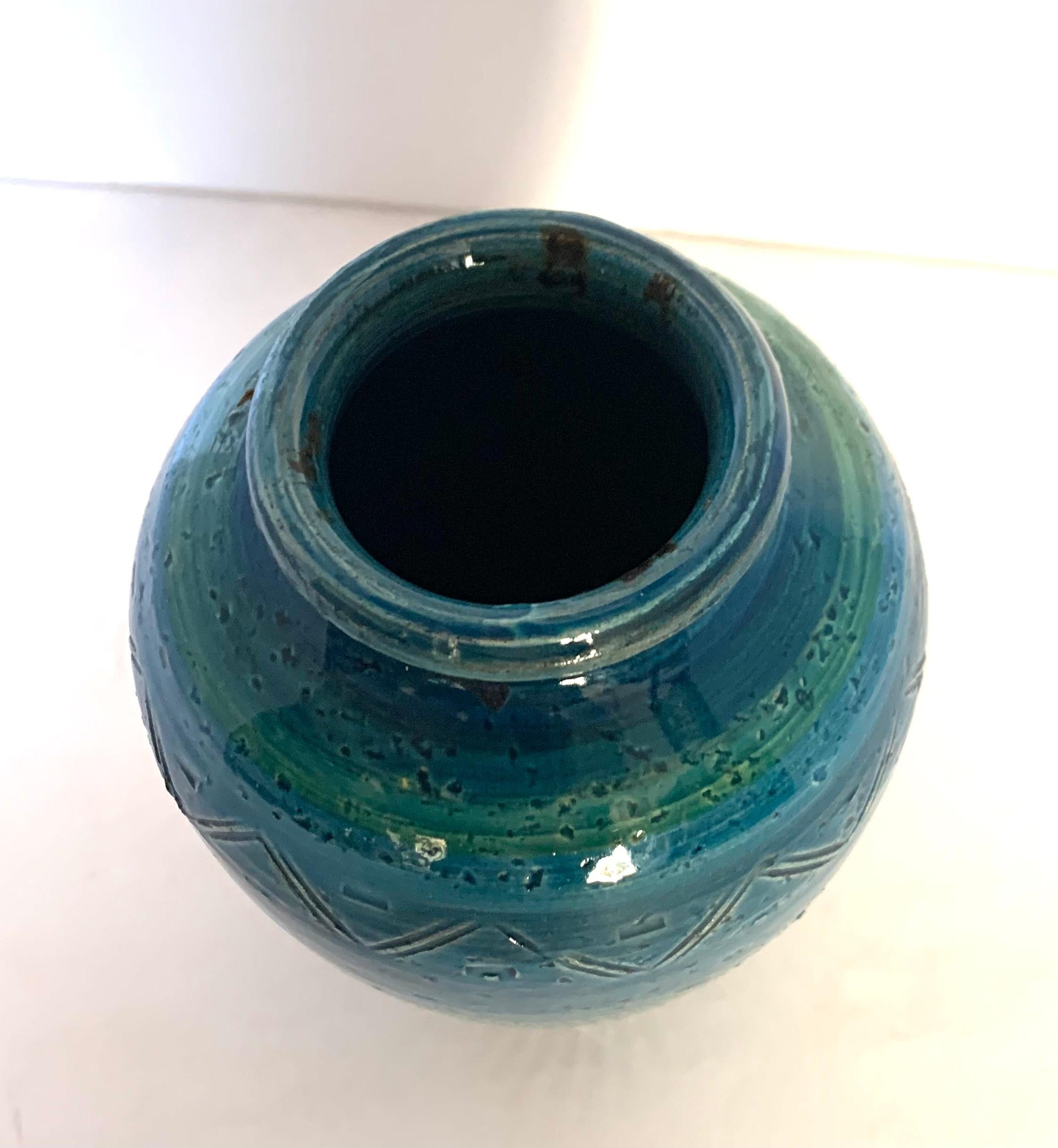 Mid century French bright blue glazed vase with chevron pattern design.
Accented green stripe.
Can hold water.
From a large collection.