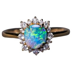 Anello di fidanzamento Boulder Opale brillante con diamante a raggiera in oro giallo 18 carati