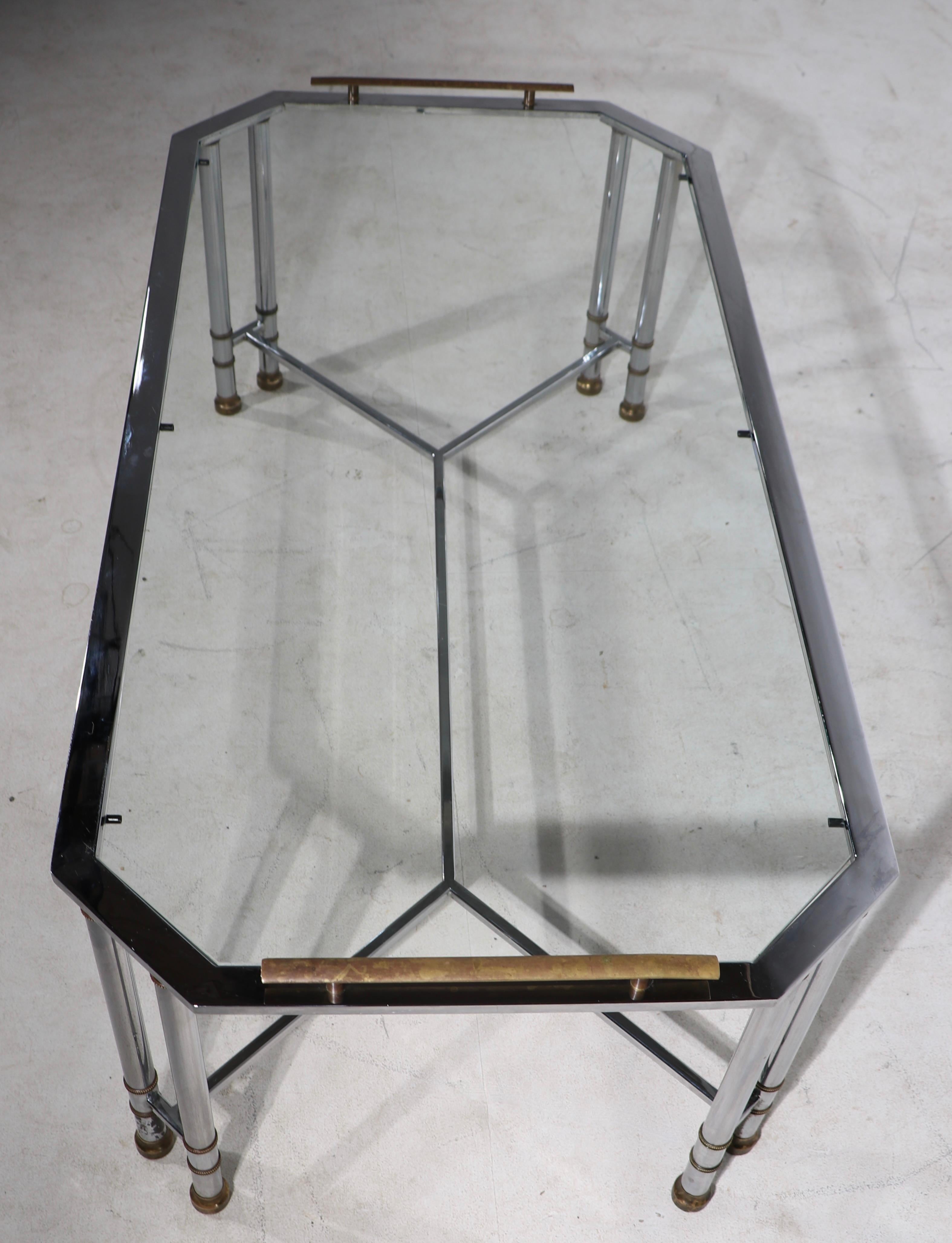 Hollywood Regency Bright Chrome Brass and Glass Coffee Table After Maison Jansen For Sale