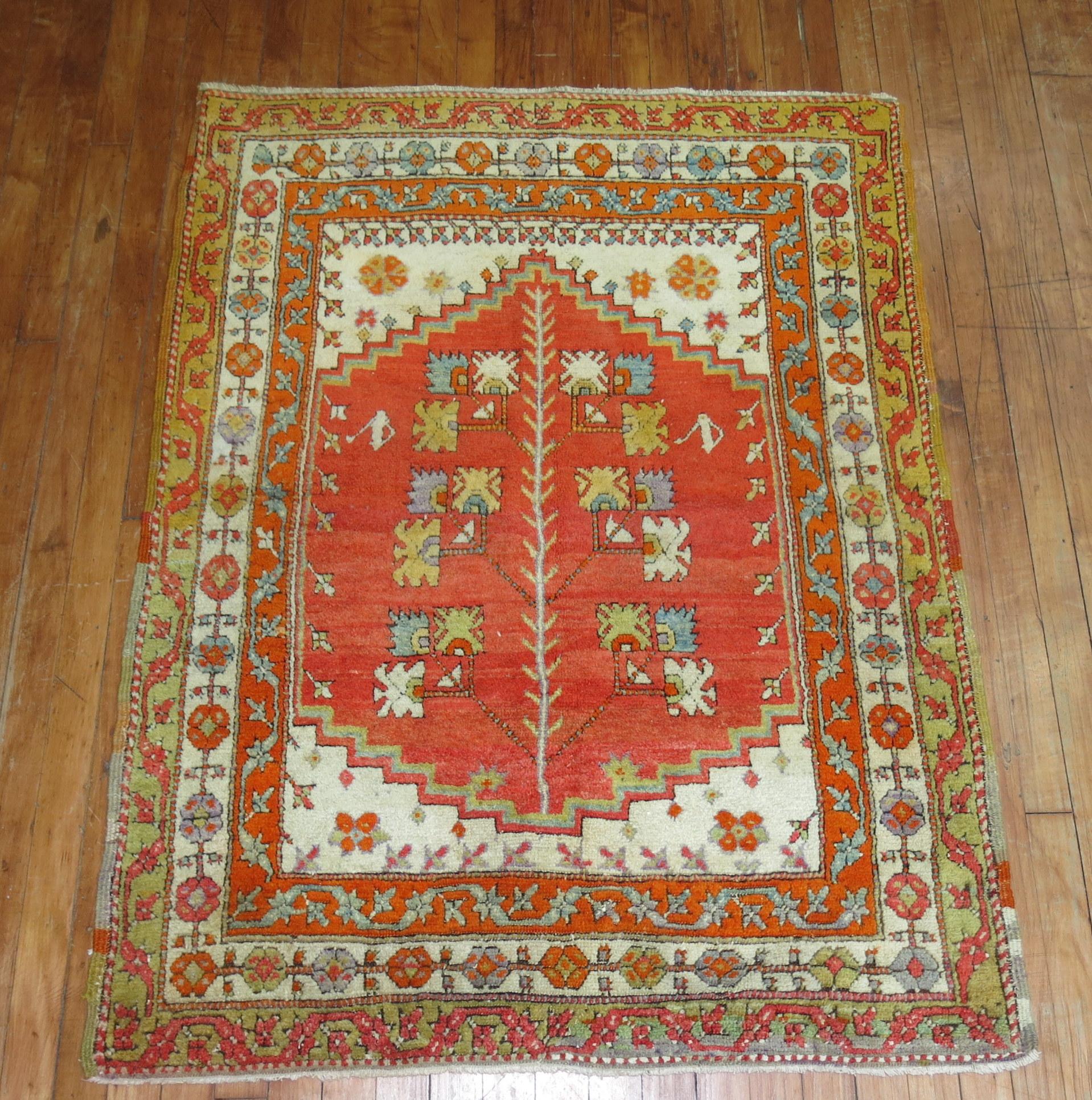 Bright coral antique Turkish Anatolian rug, circa 1930.

Measures: 3'6