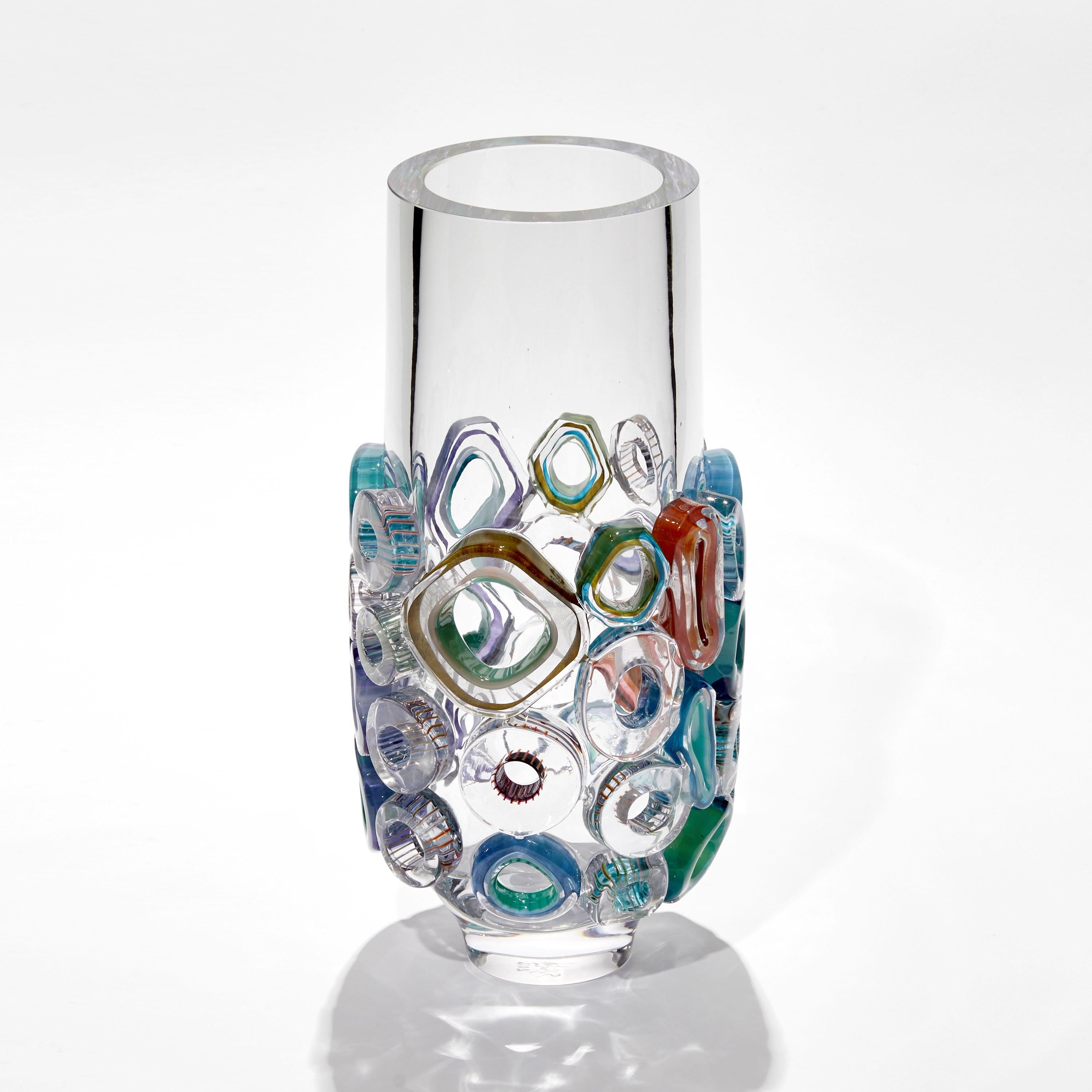 ‘Bright Field Neutral Grey’ is a unique sculptural glass vase by the German artist, Sabine Lintzen.

The initial inner form is free-blown and adorned with various individually shaped murrini. The top edge had been cut and polished to create a
