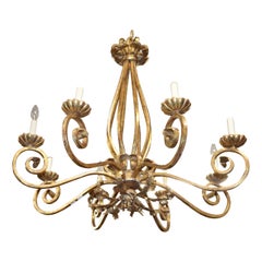 Lustre italien en fer forgé doré à 8 feux de style Hollywood Regency