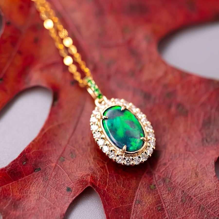 Bright Green Halo Diamond Tsavorite Australian Black Opal Pendant Necklace 18k Yellow Gold.


Free Domestic USPS First Class Shipping! Free Gift Bag or Box with every order!

Opal—the queen of gemstones, is one of the most beautiful gemstones in the