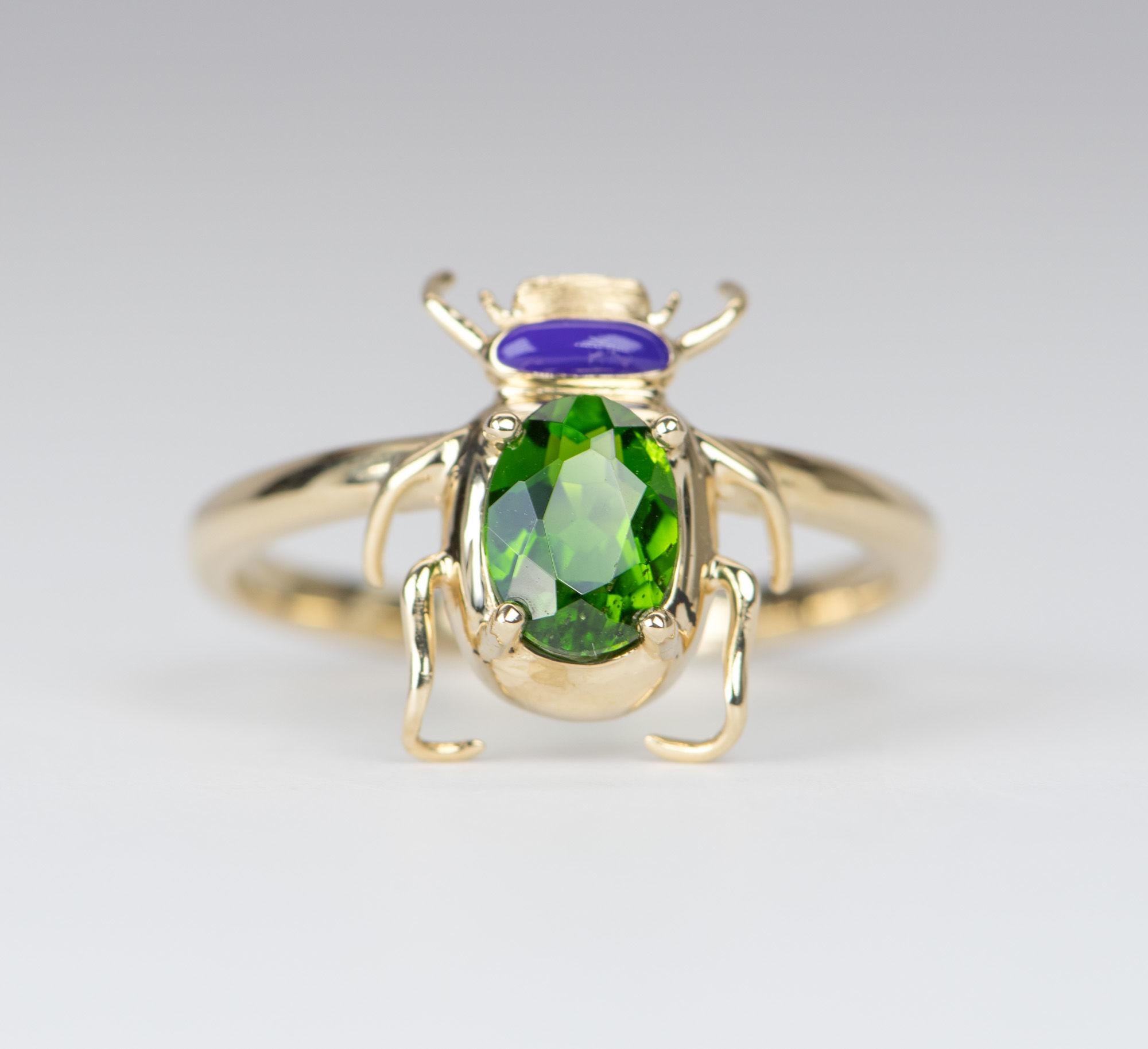 ♥ Bright Green Tourmaline 14K Yellow Gold Beetle Ring with Purple Enamel Head
♥ Solid 14k yellow gold ring set with a beautiful oval-shaped tourmaline
♥ Gorgeous green color!
♥ The item measures 13.02 mm in length, 11.8 mm in width, and stands 4.6