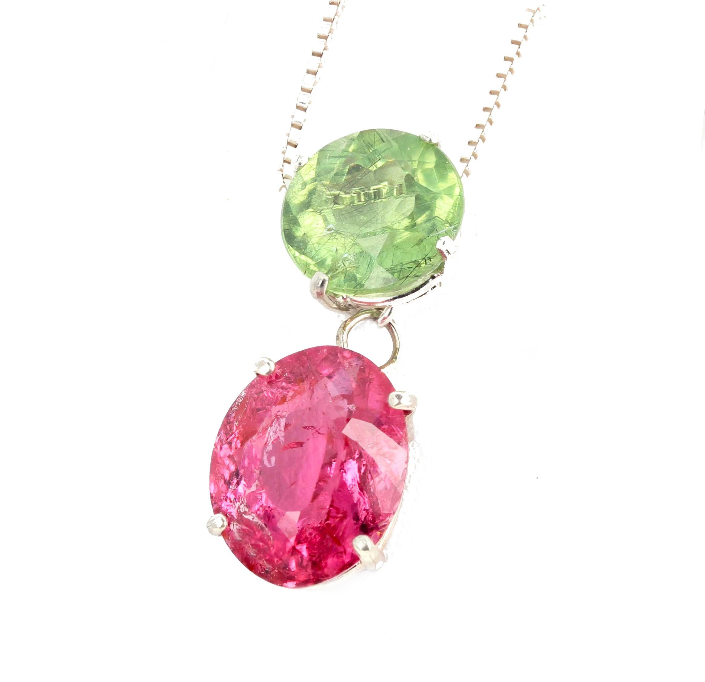 Bright round sparkling natural green 4 carat (10 mm) Tourmaline drops a glittering bright pink 6.4 carat  (13.5 mm. x 10.6 mm) natural pink Tourmaline set in a sterling silver pendant. 