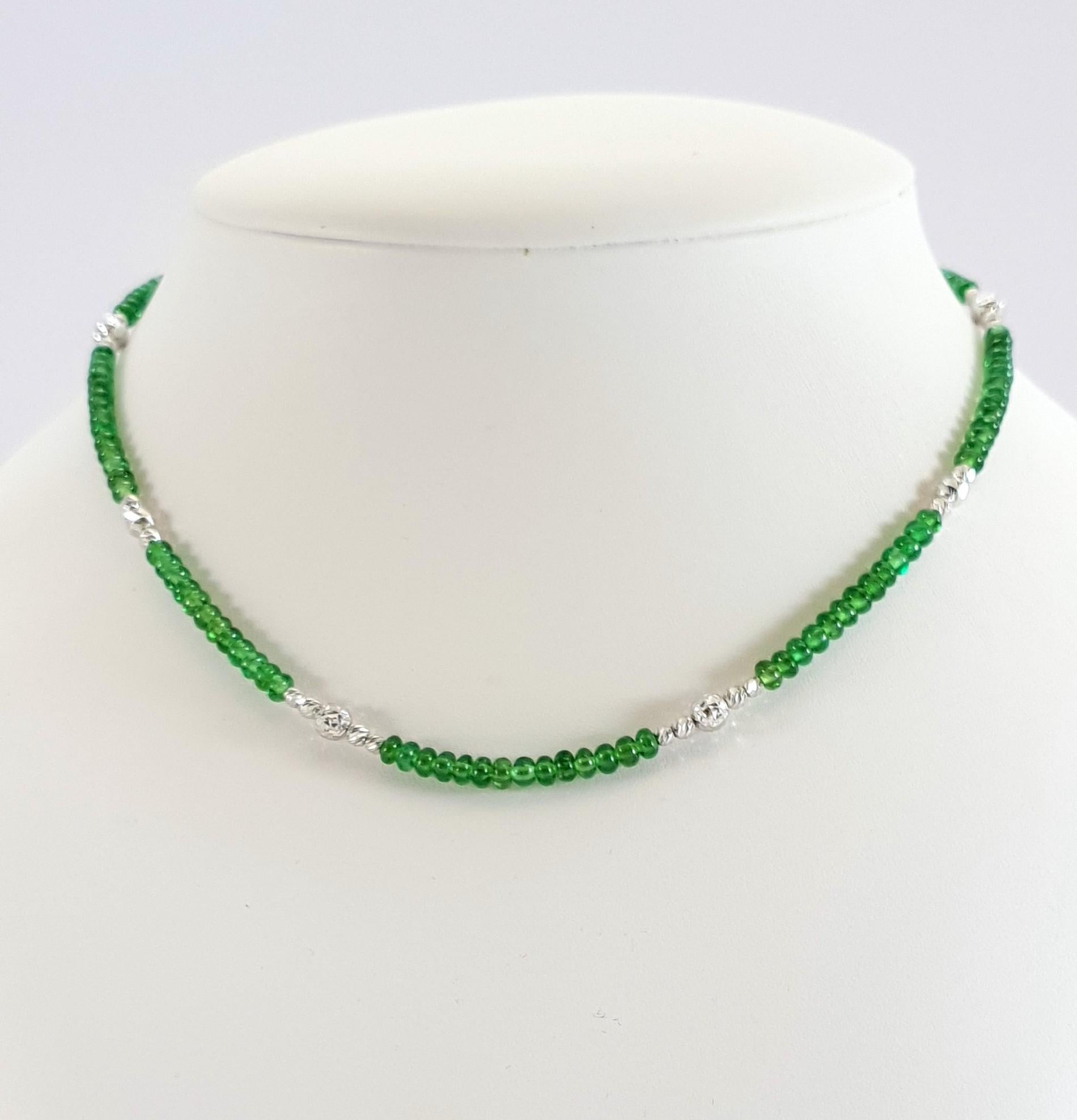 green and white beaded necklace