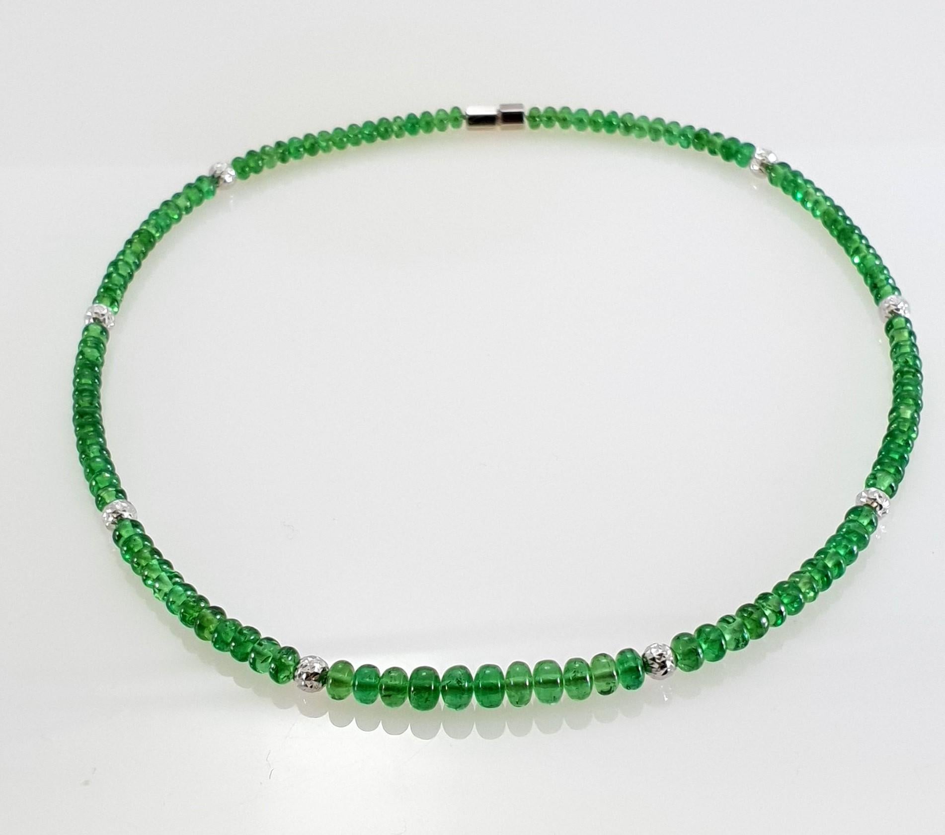 green and white beaded necklace