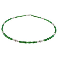 Collana di perline con rondelle di tsavorite verde brillante e oro bianco 18 carati