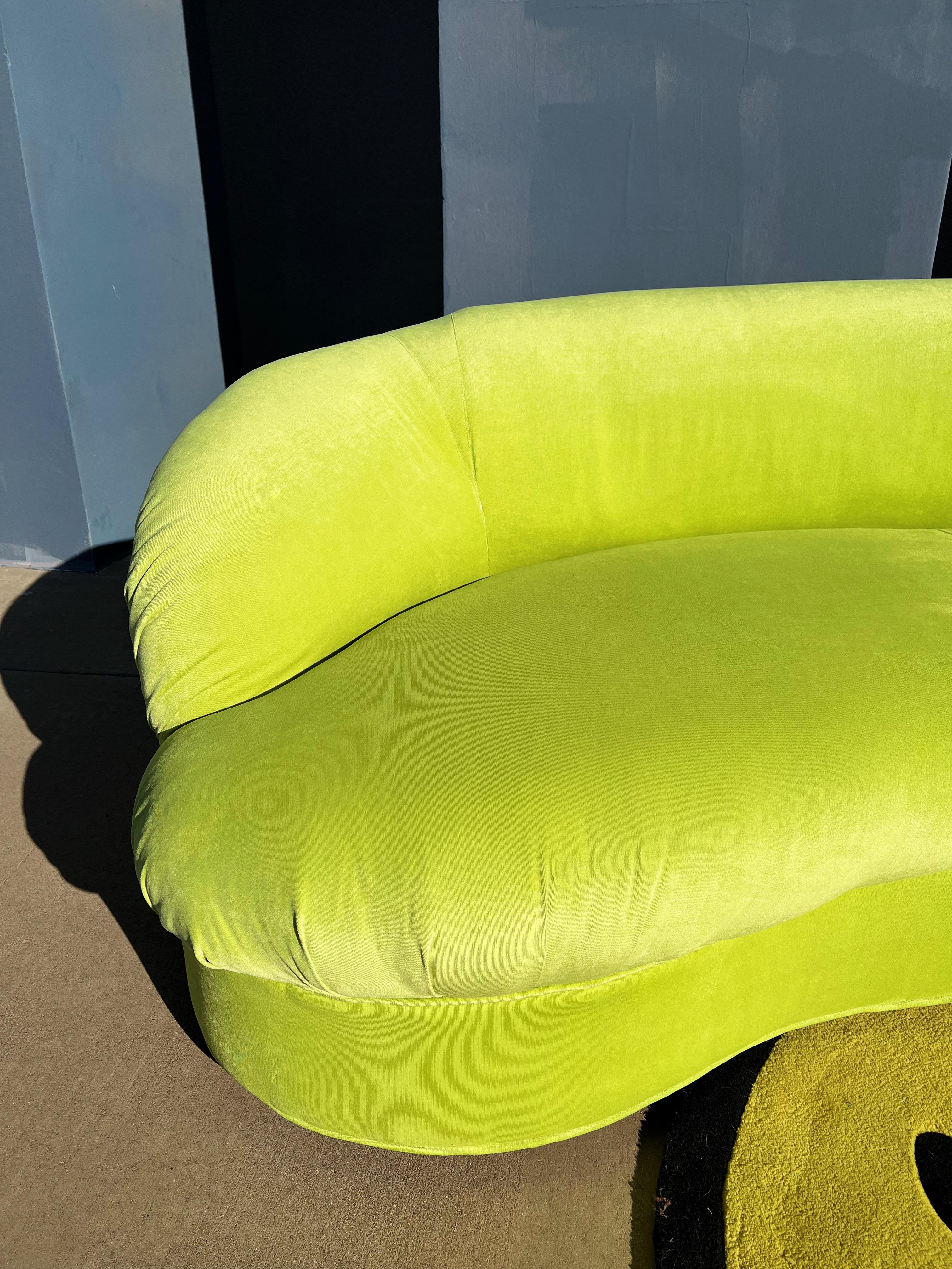 Bright green vintage curved sofa, newly upholstered in vibrant green apple velour.

Awesome condition, new upholstery, the statement your living room / office has been pleading for.

84”L x 31”T x 42”D x 17”SH