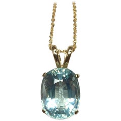 Bright Greenish Blue 3.37 Carat Aquamarine Oval Cut Solitaire Gold Pendant
