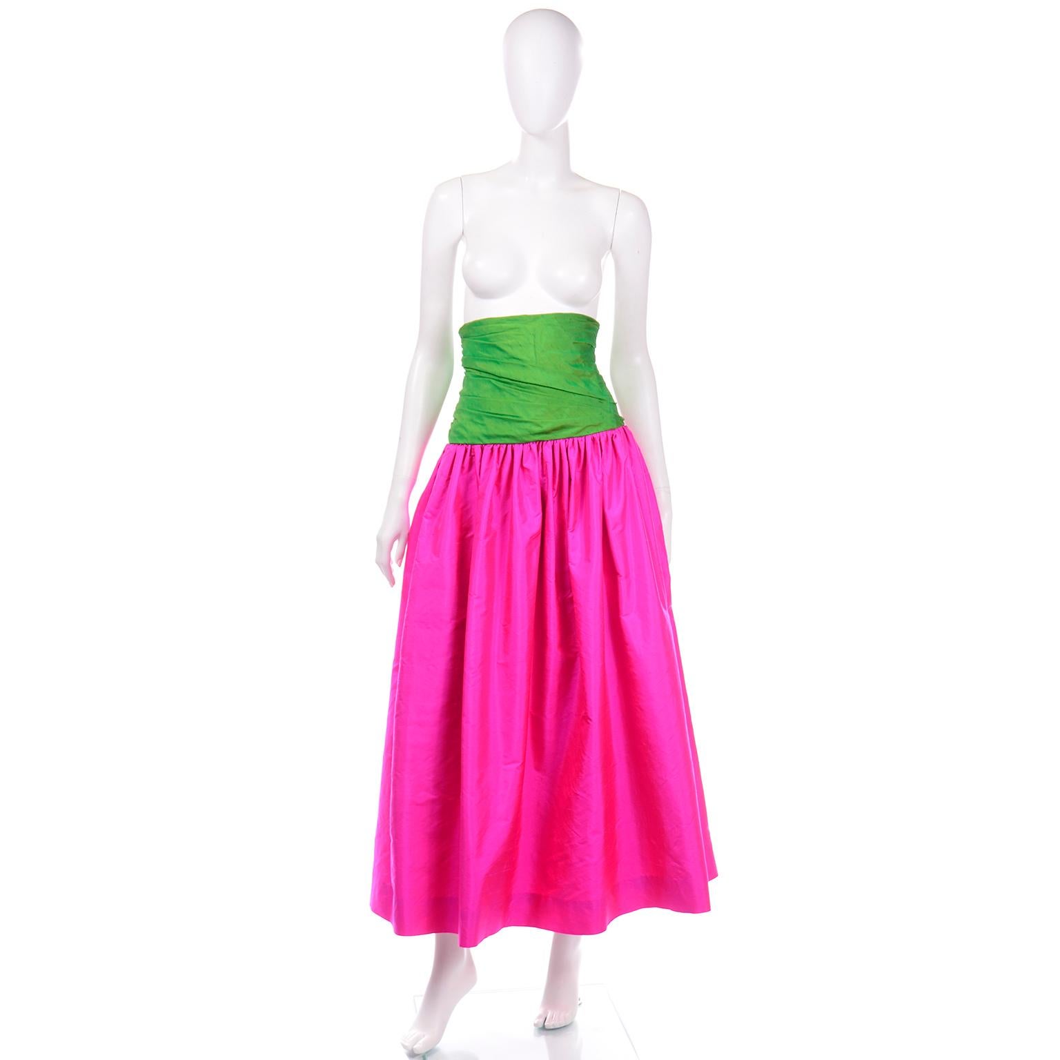 This is a really gorgeous bright vintage color block 1980's full length silk skirt with a wide bright green gathered extra wide waistband and a long hot pink skirt. This vintage evening skirt is gathered at the end of the waistband, which gives a