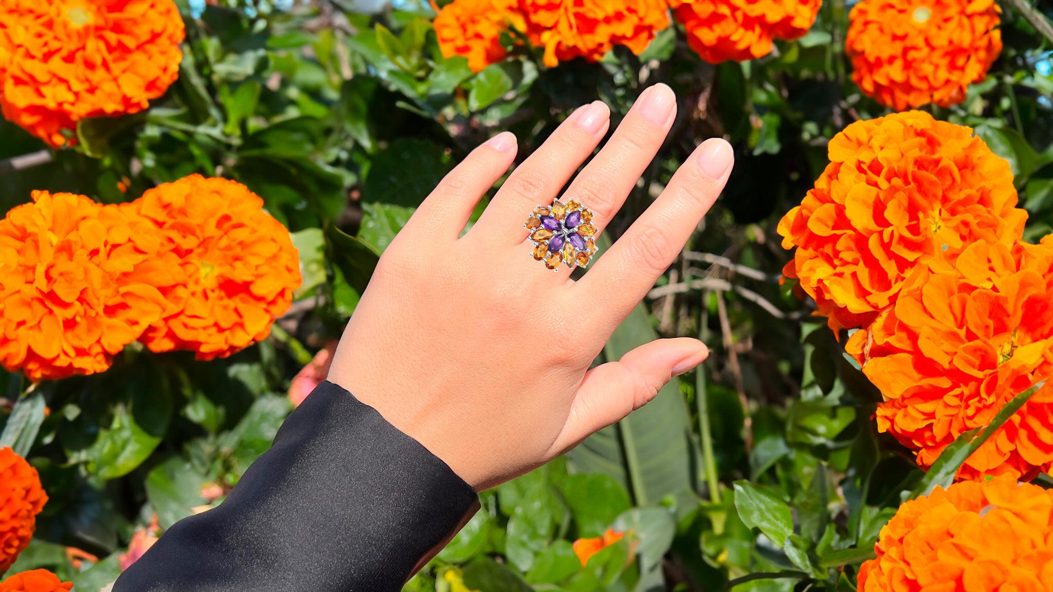 It comes with the Gemological Appraisal by GIA GG/AJP
All Gemstones are Natural
Madeira Citrines = 5.85 Carats
Cut: Marquise, Oval
Amethysts = 2.15 Carats
Cut: Marquise
Metal: Rhodium Plated Sterling Silver
Ring Size: 6* US
*It can be resized