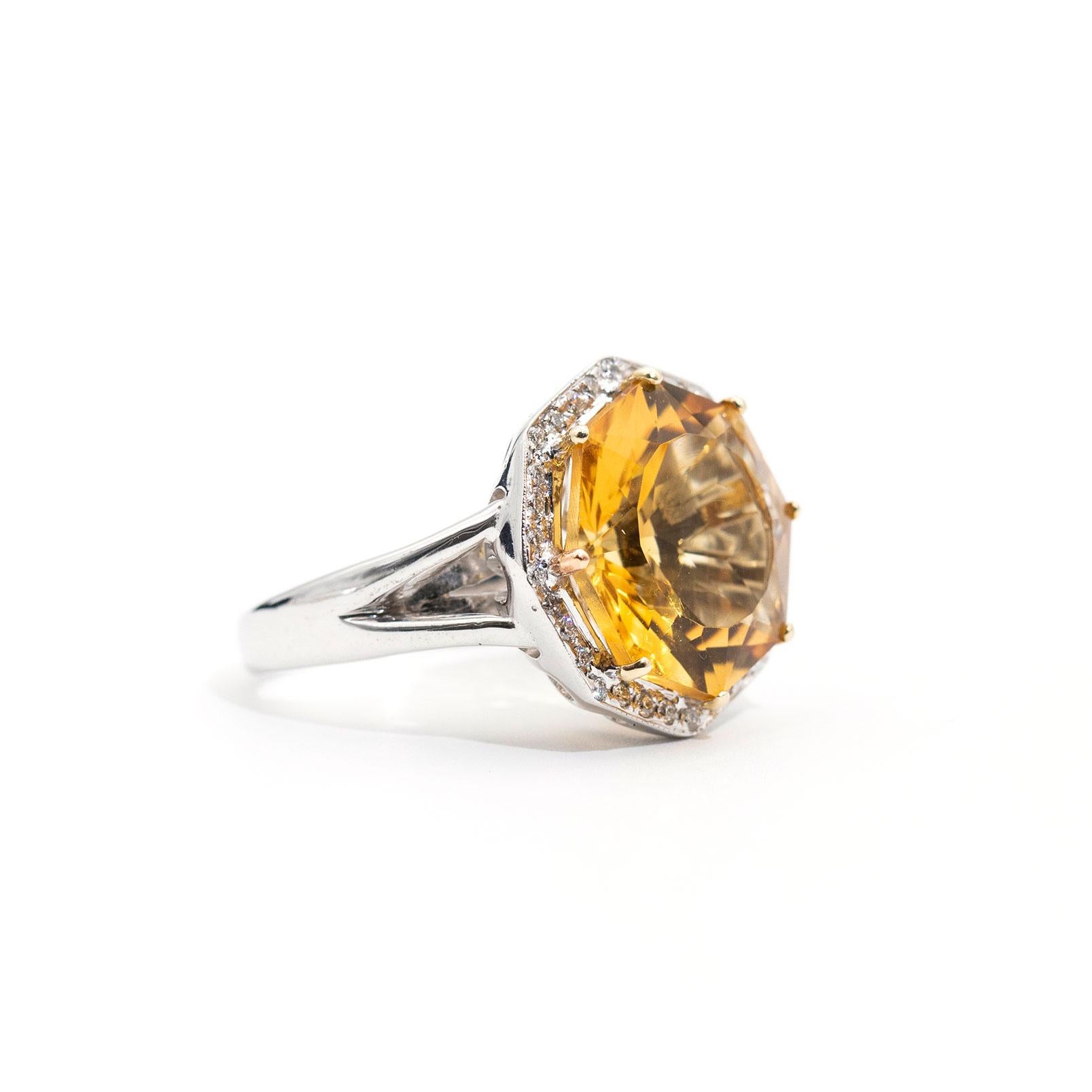 This luscious ring is forged in 18 carat white gold and boasts an amazing octagonal cut Citrine bordered by shining round brilliant cut diamonds. We have named this show-stopping piece The Mariana Ring. The Mariana Ring is perfectly proportioned and