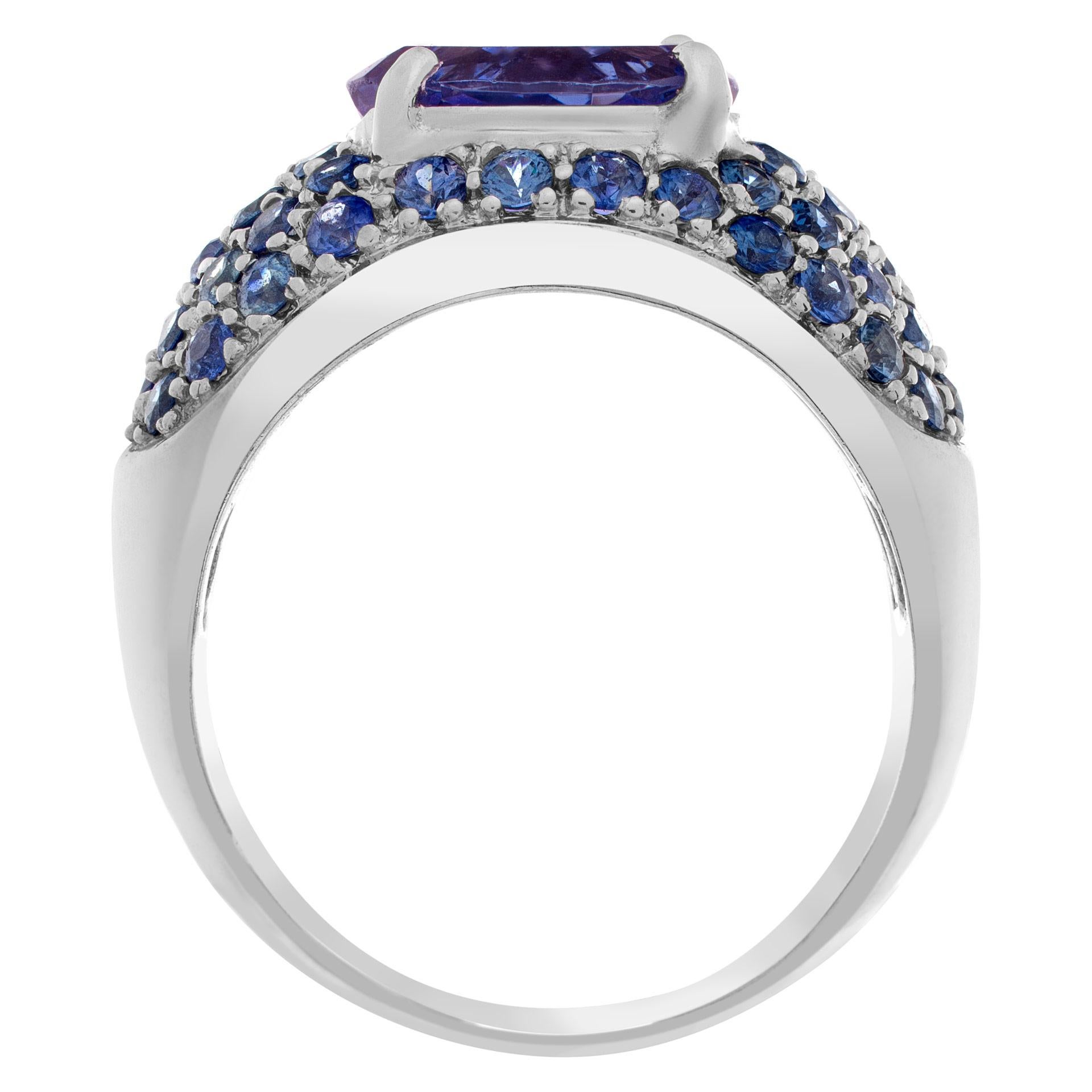 Women's Bright Oval Center 'Approximately 2 Carats' Tanzanite Surrounded by Sparkling Pa For Sale