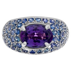 Bright Oval Center 'Approximately 2 Carats' Tanzanite Surrounded by Sparkling Pa