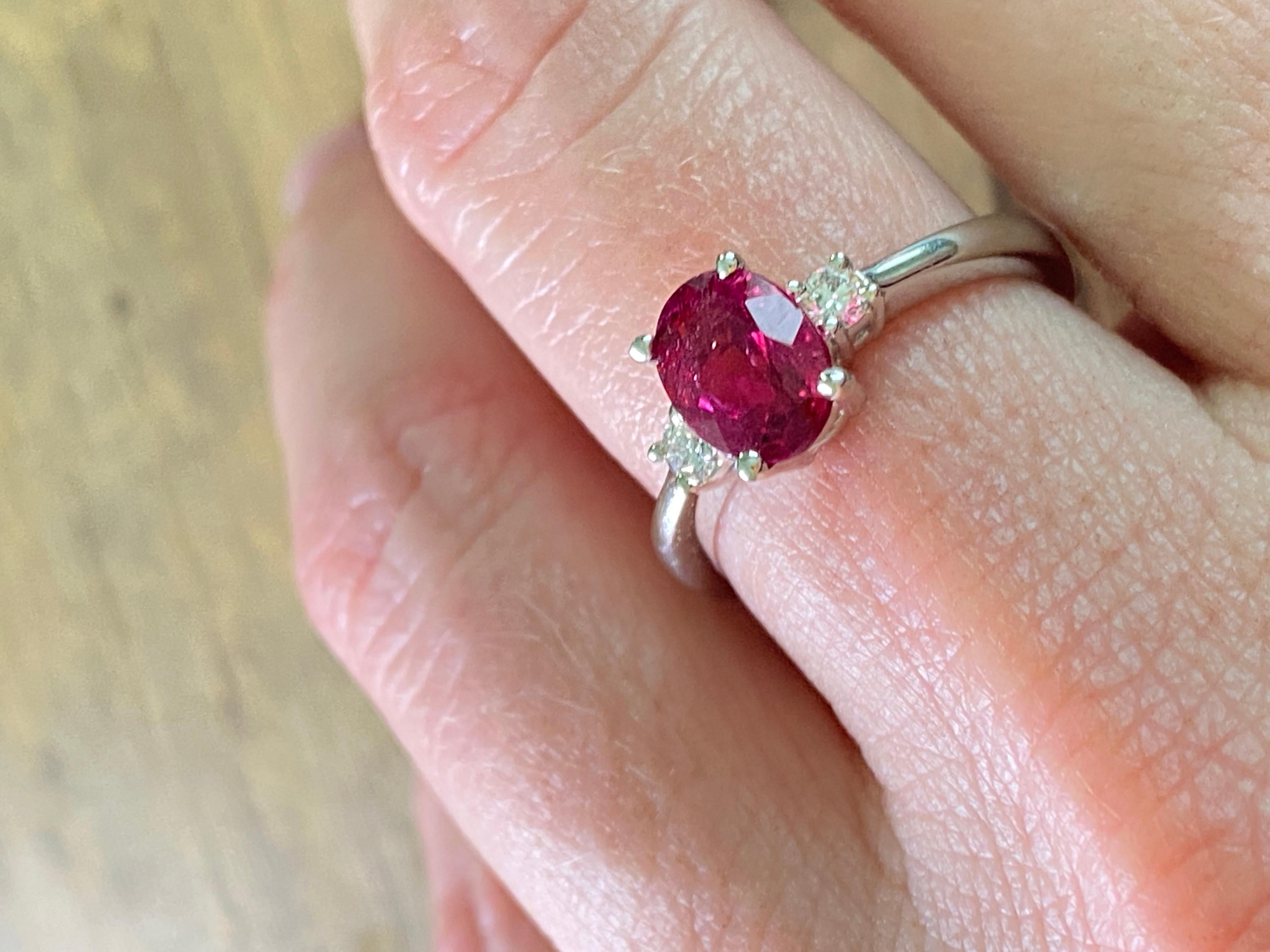 Bright, Pink, Oval Tourmaline Engagement Ring with Diamonds, 14K White Gold
Size 6 1/2
Sure stunner with this bright pink color and diamond accents.
Oval cut tourmaline is approximately 1 carat.