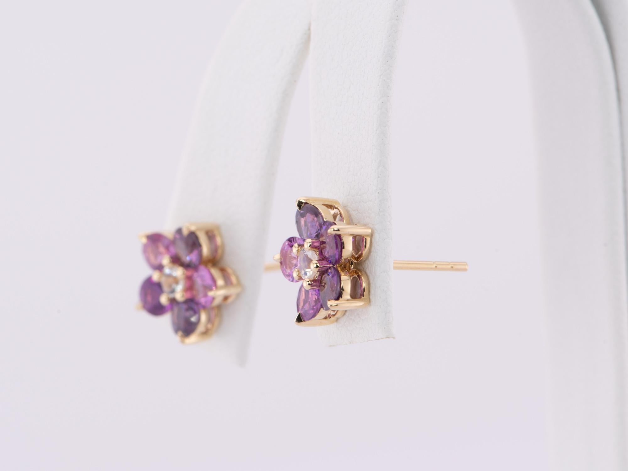 ♥ Bright Purple Sapphire and Moonstone Flower Earrings 14K Gold
♥ The item measures 9.7mm in length, 9.7mm in width, and 4mm in height.
♥ Material: 14K Yellow Gold
♥ Gemstone: Sapphire, 2.1ct. Moonstone, 0.18ct
♥ All stone(s) used are genuine,