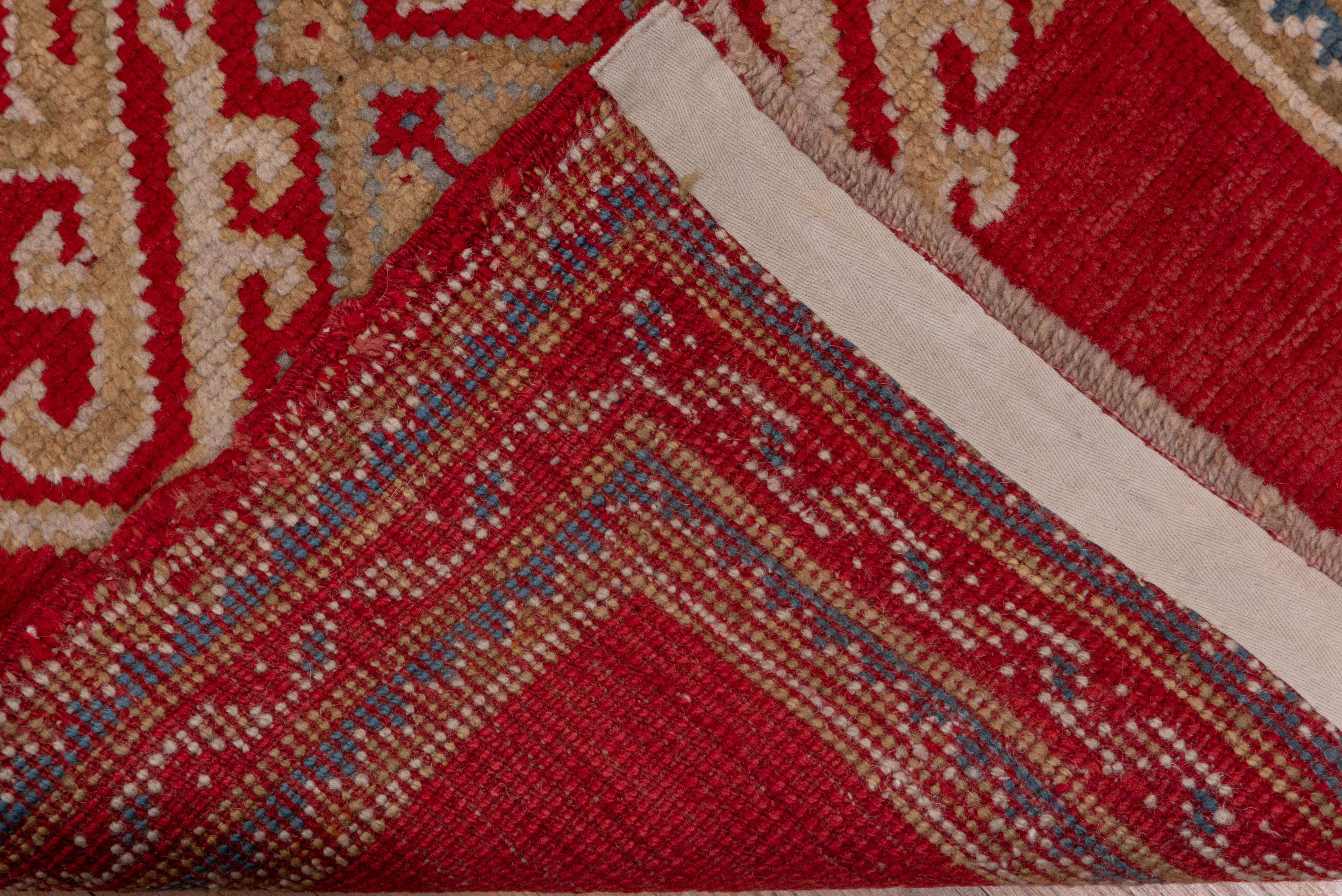 Bright Red Antique Long & Narrow Oushak Runner, circa 1930s In Good Condition In New York, NY
