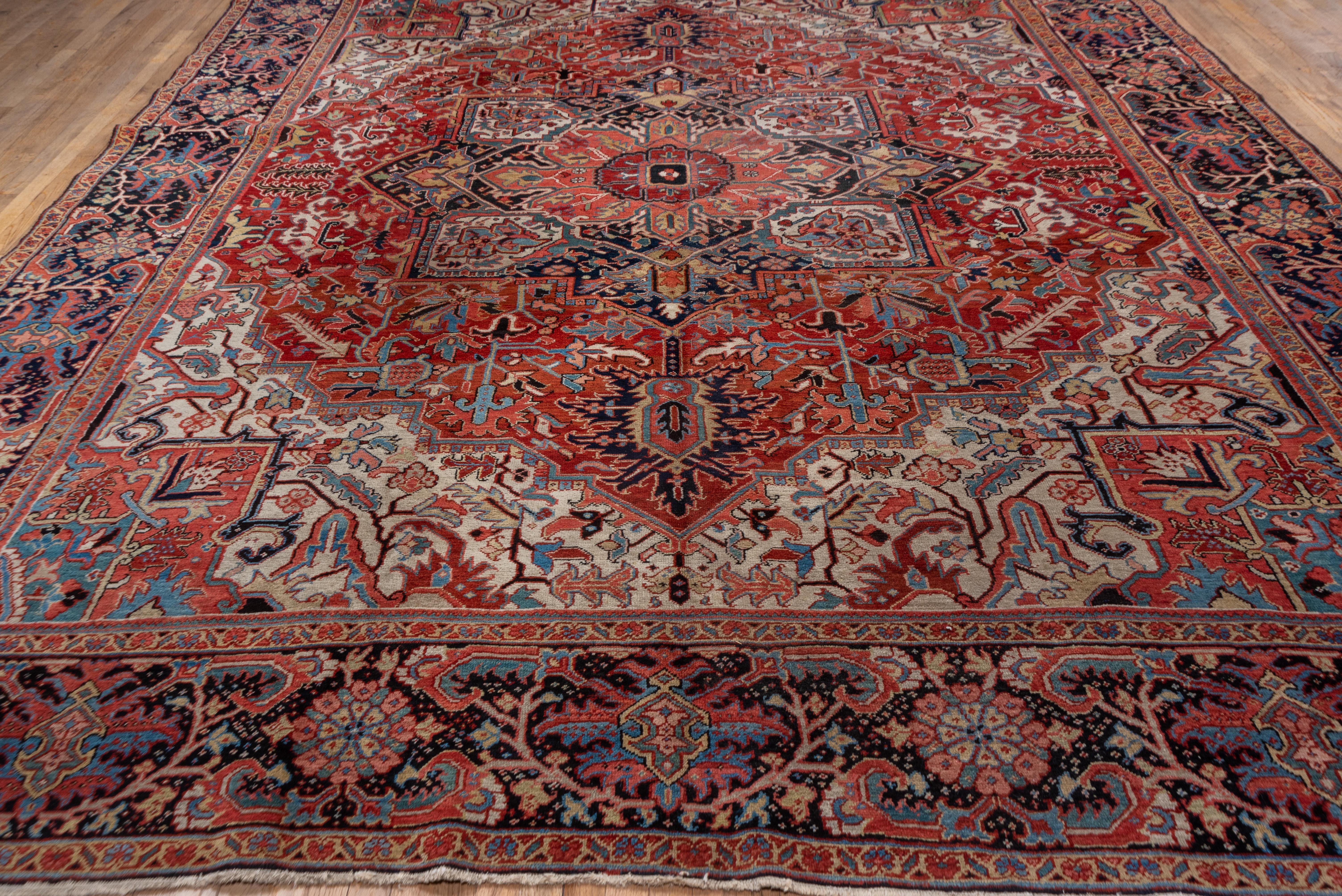 Hand-Knotted Bright Red Field Antique Persian Heriz Carpet For Sale