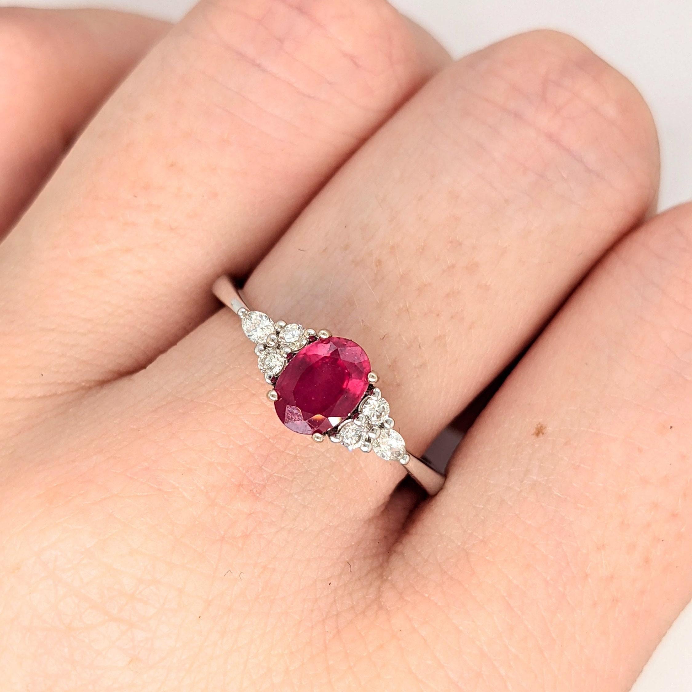 This beautiful ring features a 1.18 carat oval ruby gemstone with a triad of natural earth mined diamonds on both sides, all set in solid 14K gold. This ring can be a lovely July birthstone gift for your loved ones!

**We offer complimentary