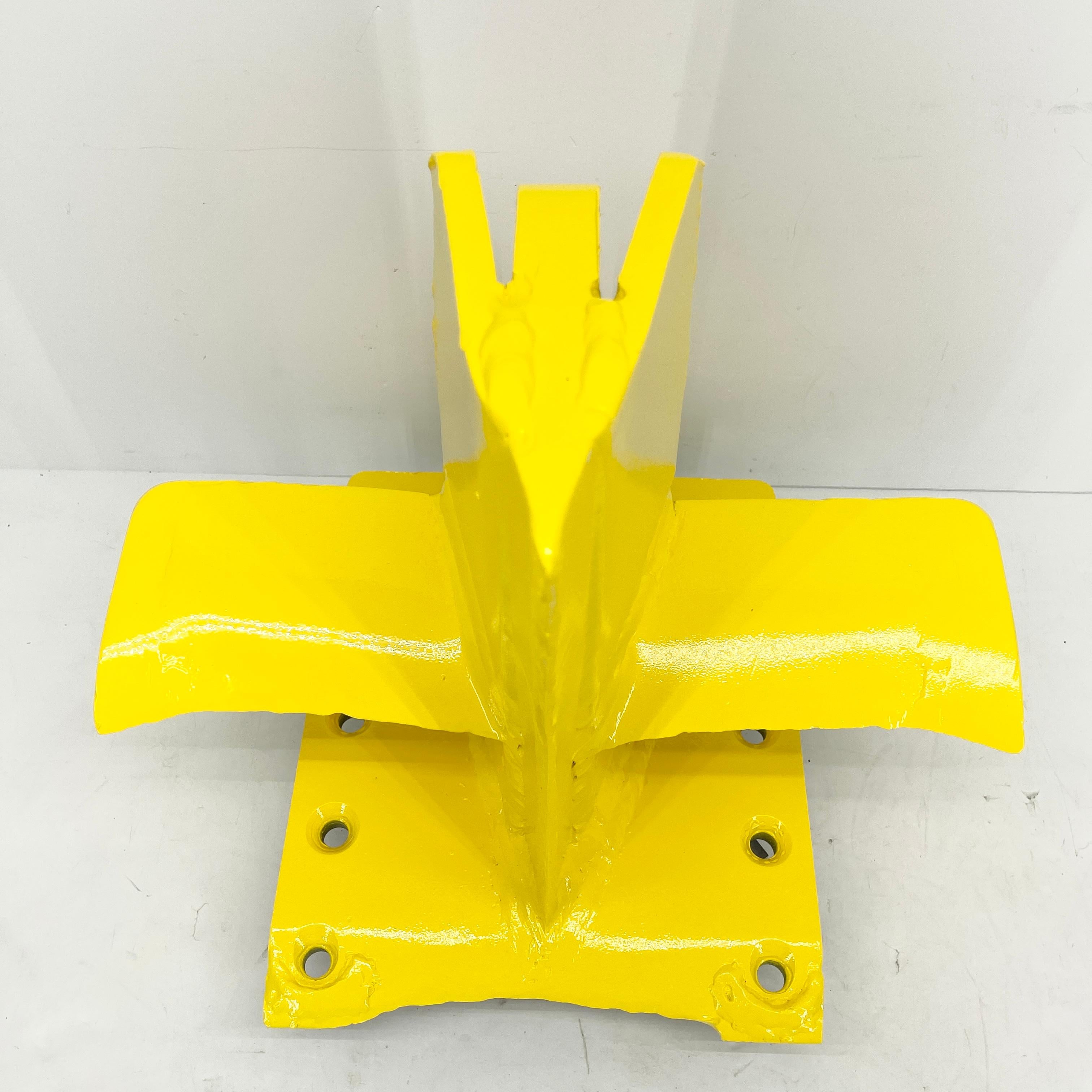 Industrial powder-coated eagle-shaped iron log splitter. Newly painted in thick bright sunshine yellow powder-coating. Just look at this heavy industrial iron wood splitter! The top piece is shaped like an eagle and the yellow paint is a real show