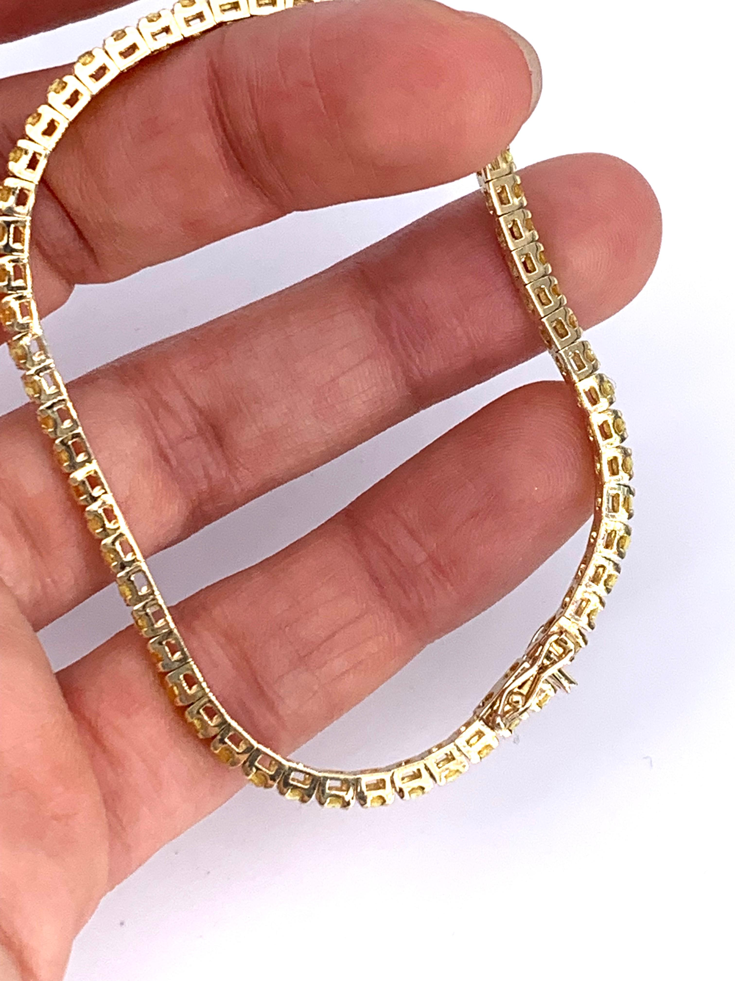 Bracelet tennis unisexe en or jaune 18 carats avec saphirs jaunes de 4,34 carats Neuf à Florence, IT