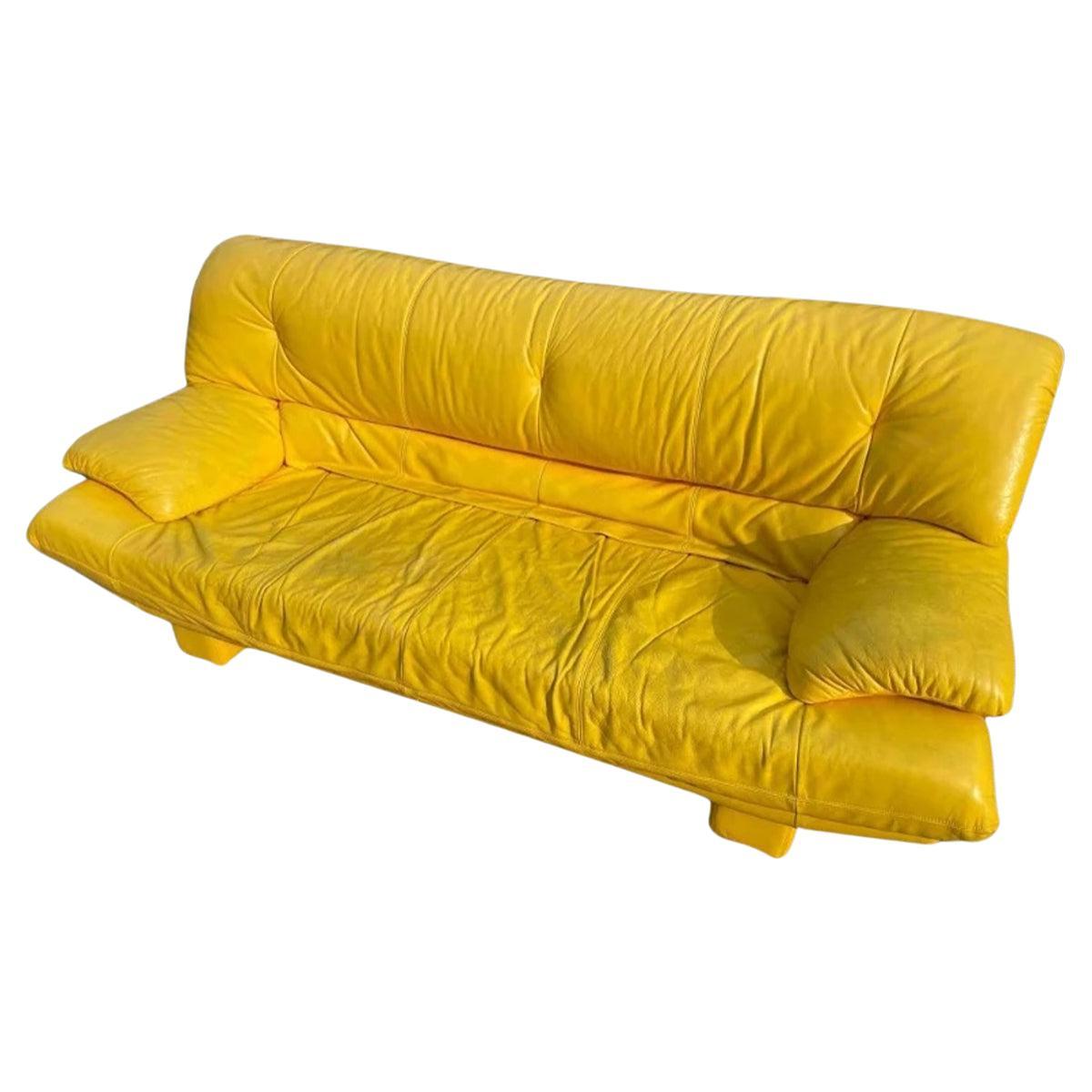 Bright Yellow Nicoletti Salotti Post Modern Italian 3 seat Leather Sofa. Very fun Beautiful pop art bright yellow long leather sofa. Very good vintage condition will transform any space into a pop of color. Very Modern Italian design. Made in Italy.