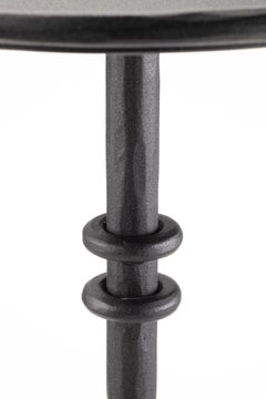 Brighten up your outdoor space with our painted iron outdoor table, featuring an