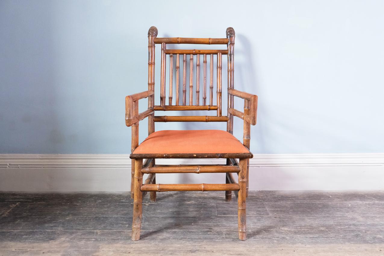 Brighton Pavilion Chinoiserie bamboo armchair with an upholstered seat, English, circa 1820-30s.

Material: bamboo frame and upholstered seat

Dimensions: H104 x W63 x D64 cm.