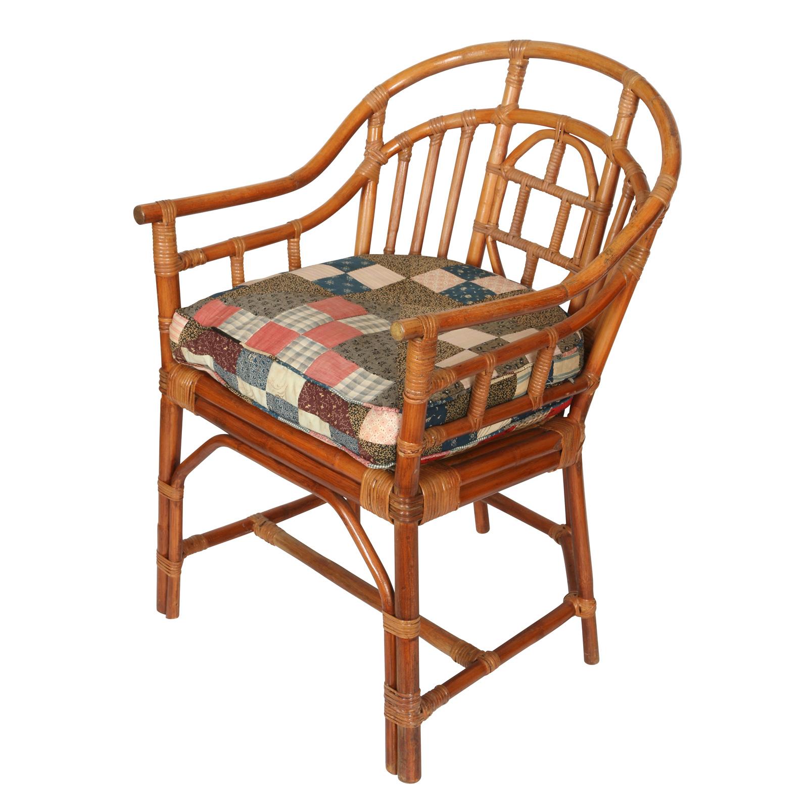 Brighton pavillion curved rattan Chinese arm chair with removable seat cushion.