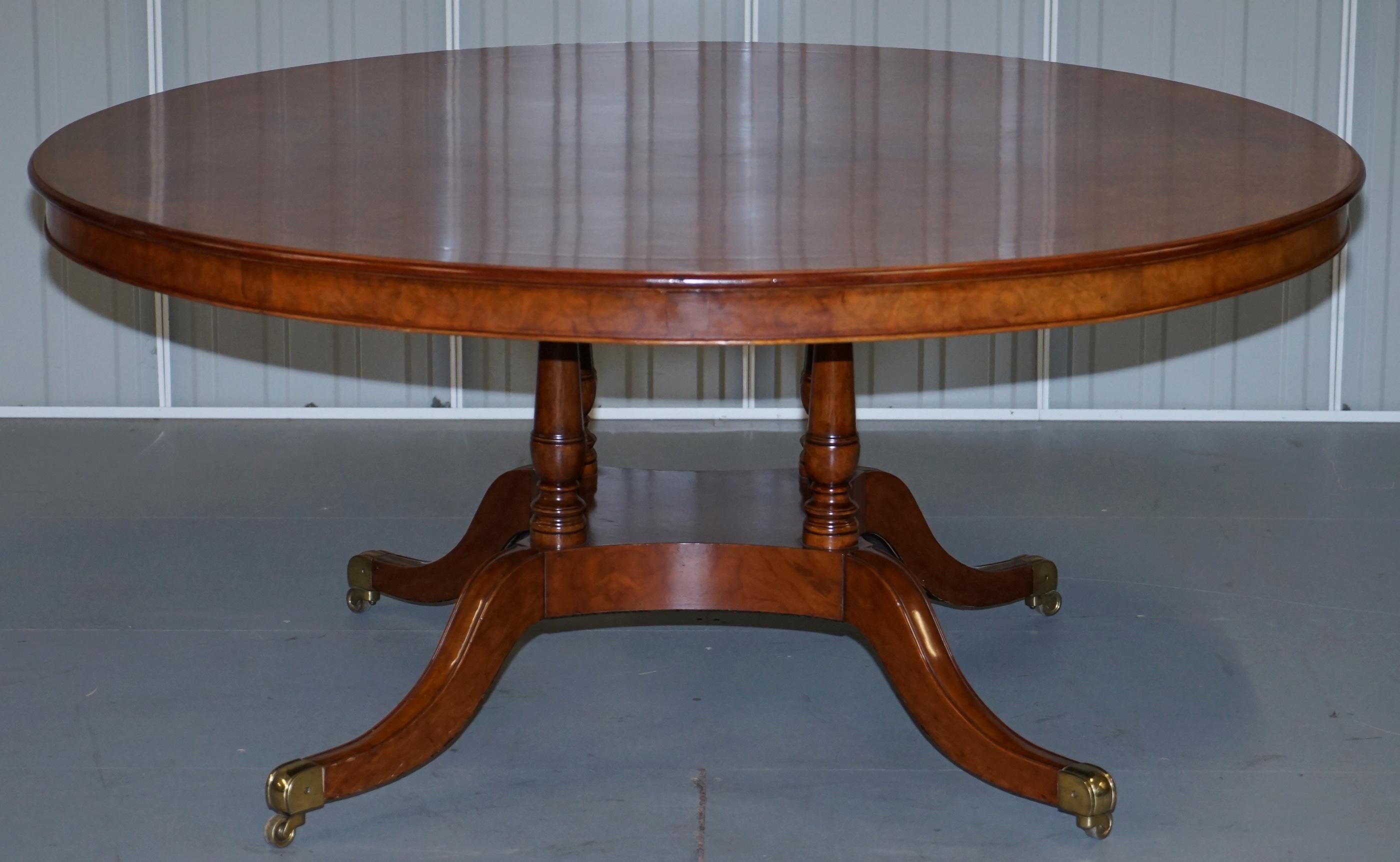 We are delighted to offer for sale this lovely RRP £6999 Brights of Nettlebed large round burr walnut dining table with solid brass castors 

A grand stylish and decorative table, the walnut is thick and nicely cut, the table has a four pillar