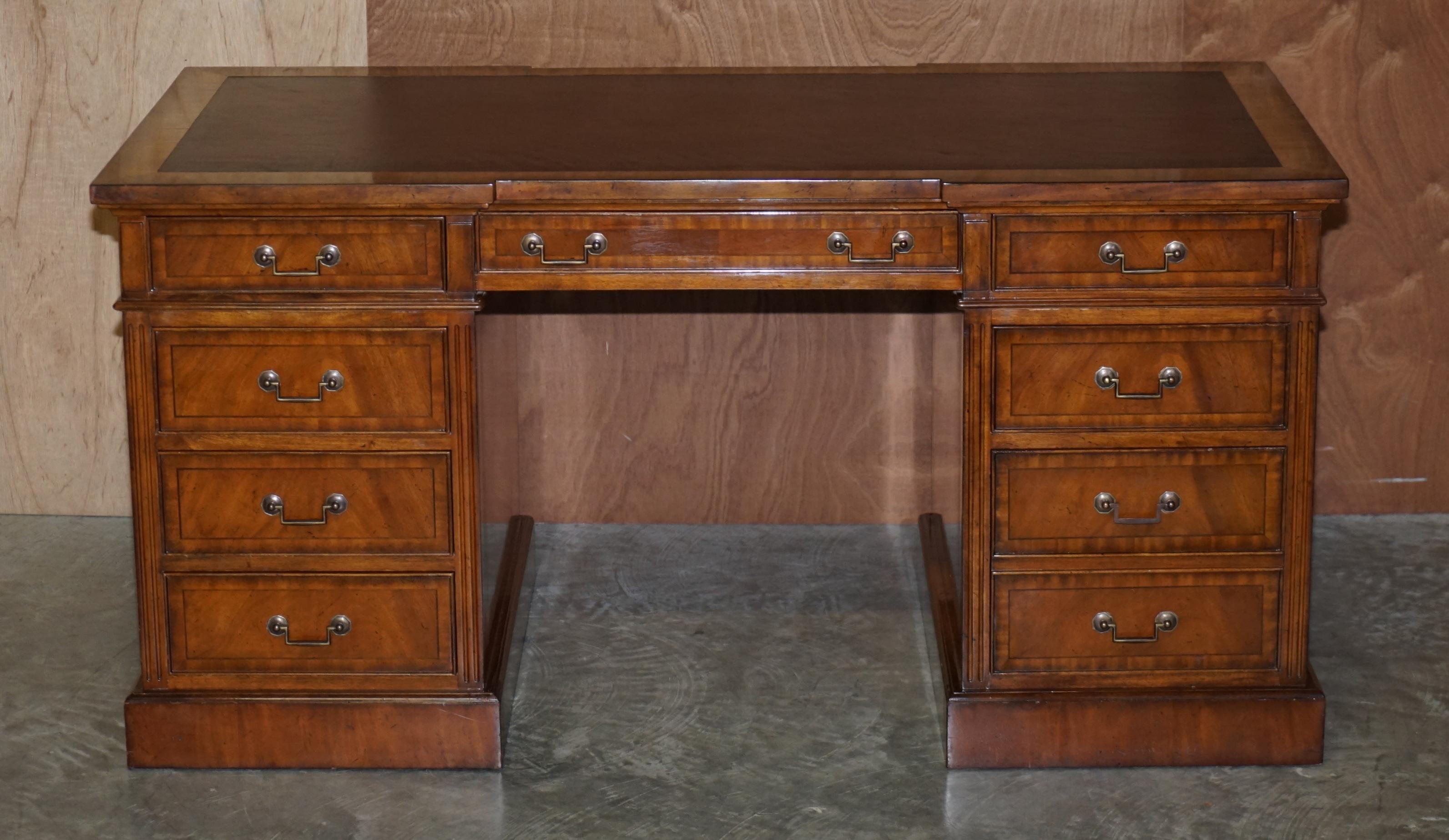 We are delighted to offer this stunning double sided flamed mahogany with brown leather Brights of Nettlebed, inverted breakfront pedestal desk that is double sided

A very good looking well made and decorative partners desk. It is double sided in