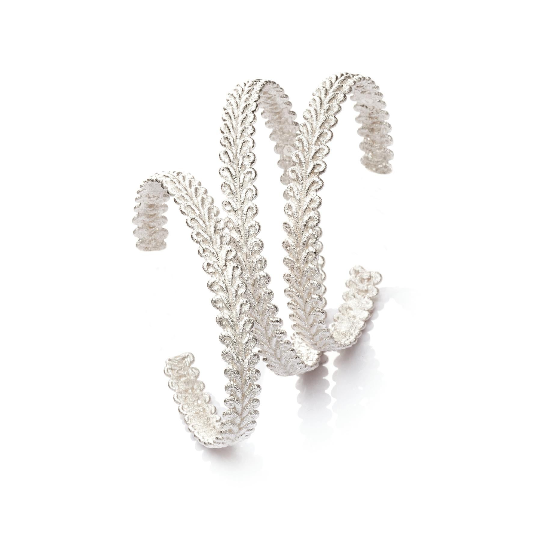 Made in sterling silver, this delicate cuff is perfect for a bride to be or for anyone who is a true romantic at heart! Brigitte takes her inspiration from lace and this Bordure bracelet is a perfect example of understated femininity.

Like an
