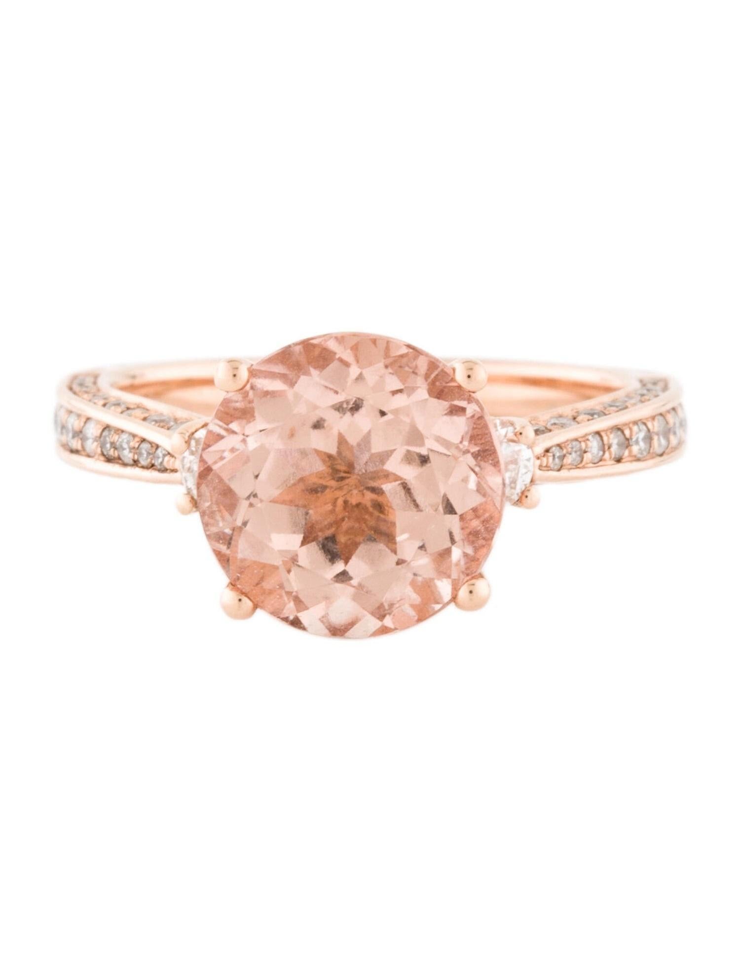 This is an alluring natural morganite and diamond ring set in solid 14K rose gold. The natural round cut 3.29 Ct morganite has an excellent peachy pink color and is accompanied by round cut white diamonds. The ring is stamped 14K and is a true
