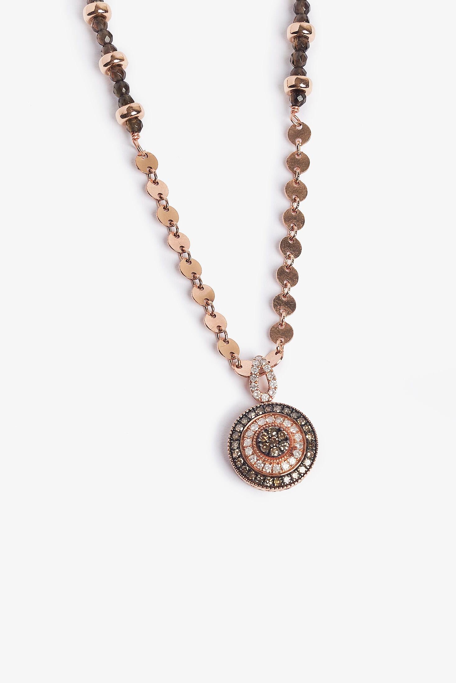 This stunning rose gold necklace is adorned with brown and white diamonds.  The limited edition rose gold is accented with smoky quartz.  Be sure to checkout the matching Brilliance earring.