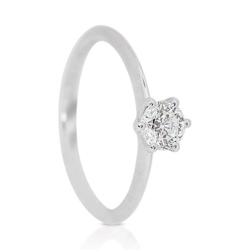 Round Cut Brilliant 0.51ct Solitaire Diamond Ring set in gleaming 18K White Gold For Sale