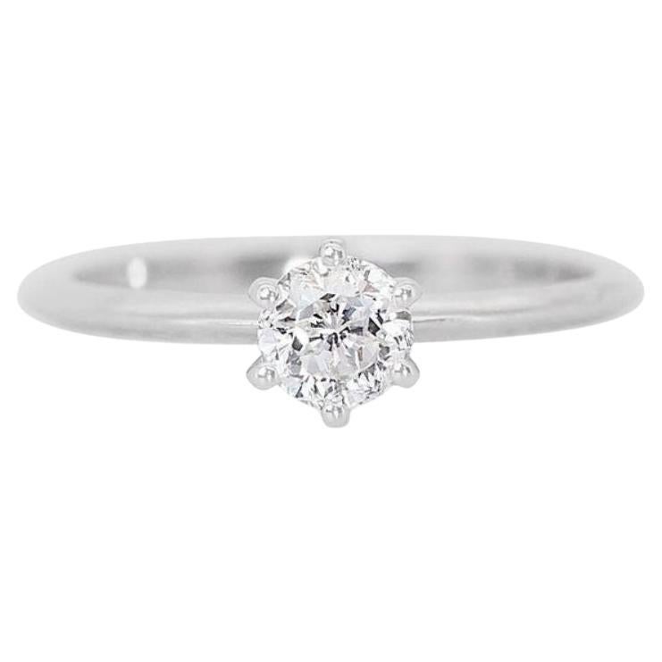 Brilliant 0.51ct Solitaire Diamond Ring set in gleaming 18K White Gold For Sale